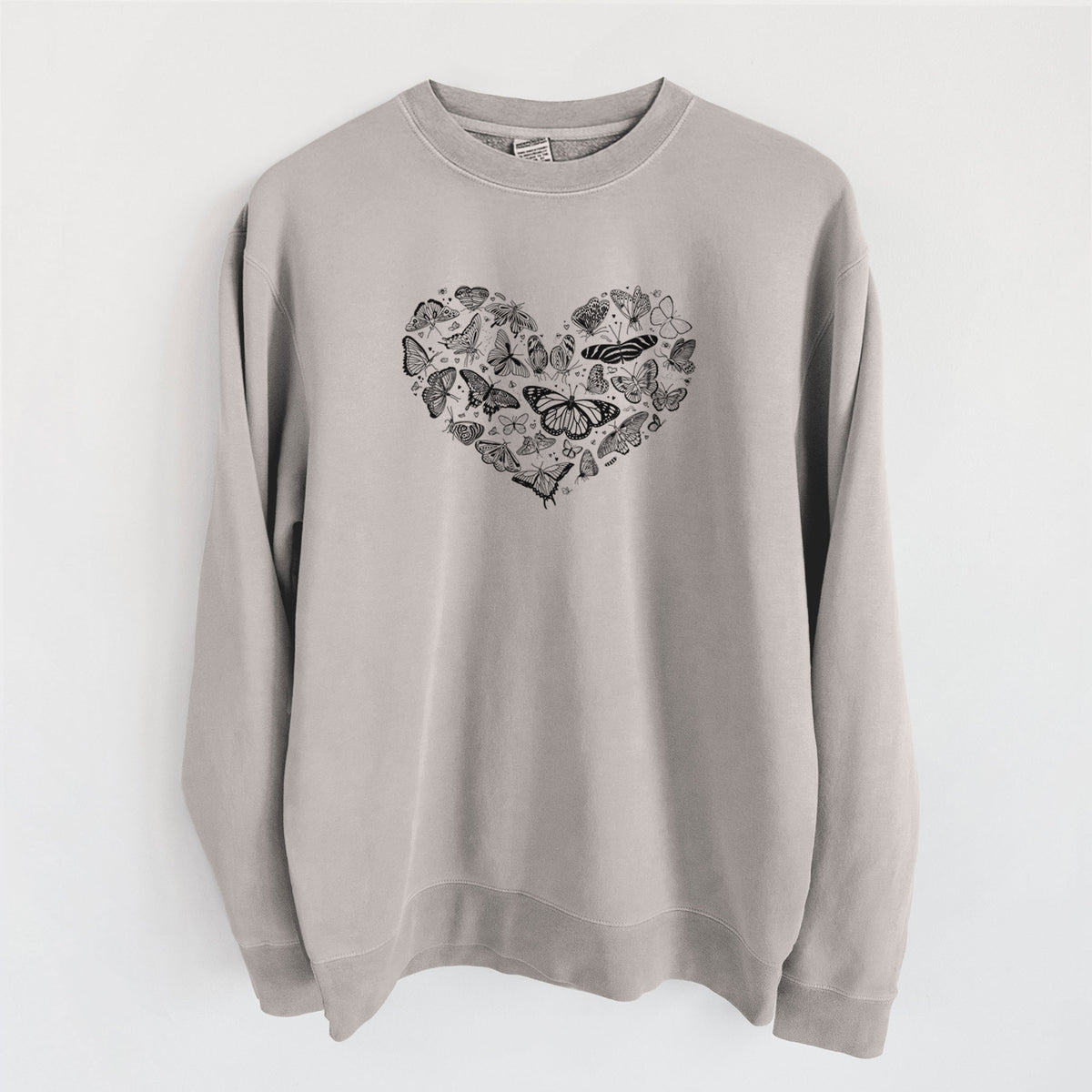 Cement grey pigment dyed crewneck sweatshirt laid flat, printed with a heart shape filled with small black ink butterflies and moths.