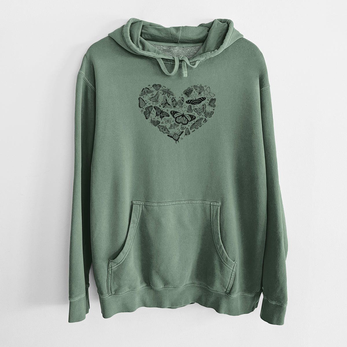 Alpine green pigment dyed hoodie laid flat, printed with a heart shape filled with small black ink butterflies and moths.