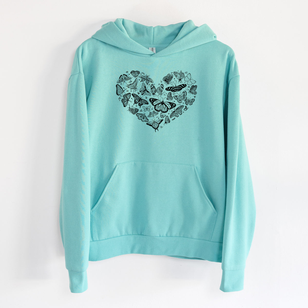 Heart Full of Butterflies - Statement Midweight Hoodie in Seafoam, hanging on a white wall, with a front kangaroo pocket and no drawcords.