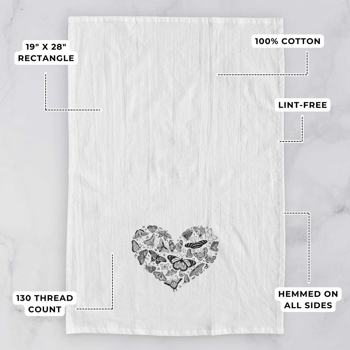 White tea towel printed with a heart shape filled with small black ink butterflies and moths, with feature labels: 19 by 28 inch rectangle, 100% cotton, lint-free, 130 thread count, hemmed on all sides.