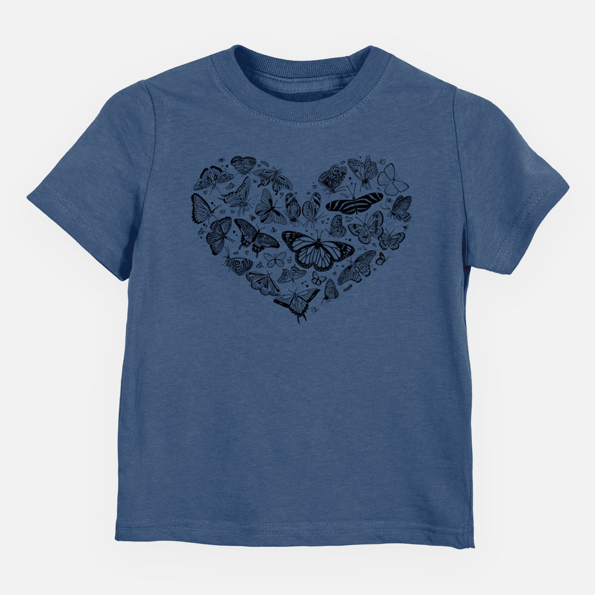 Indigo blue toddler t-shirt laid flat, printed with a heart shape filled with small black ink butterflies and moths.