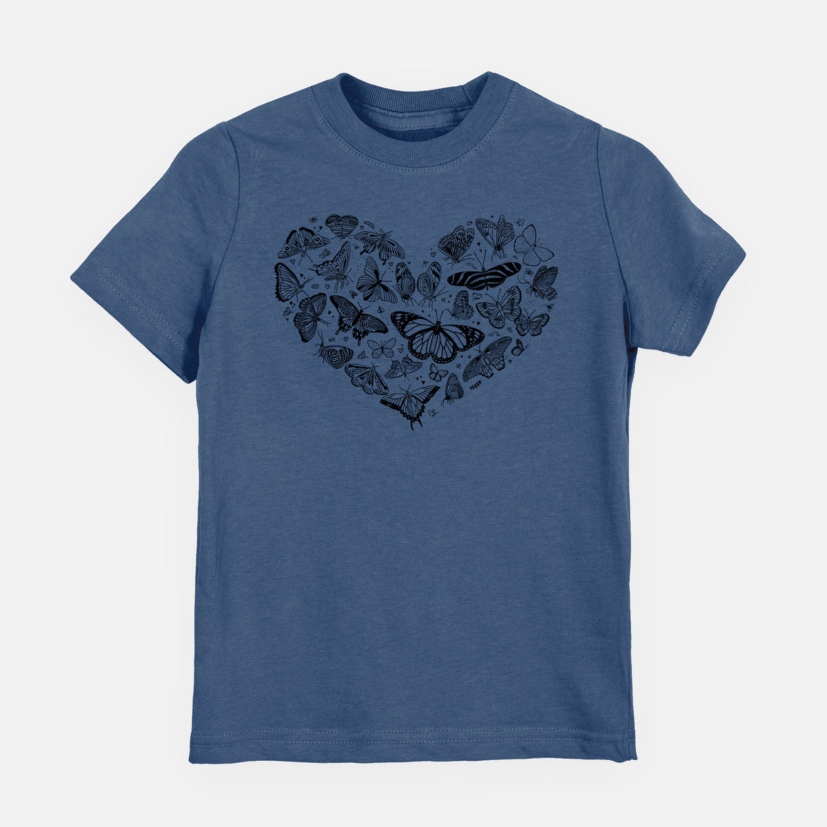 Indigo blue youth t-shirt laid flat, printed with a heart shape filled with small black ink butterflies and moths.