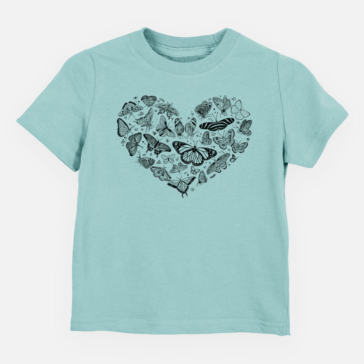 Saltwater toddler t-shirt laid flat, printed with a heart shape filled with small black ink butterflies and moths.