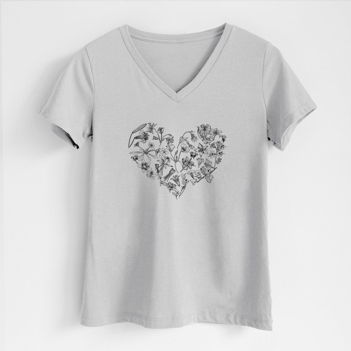Lunar grey women's relaxed fit cotton V-neck t-shirt laid flat, printed with a heart shape filled with black ink California mountain wildflowers.