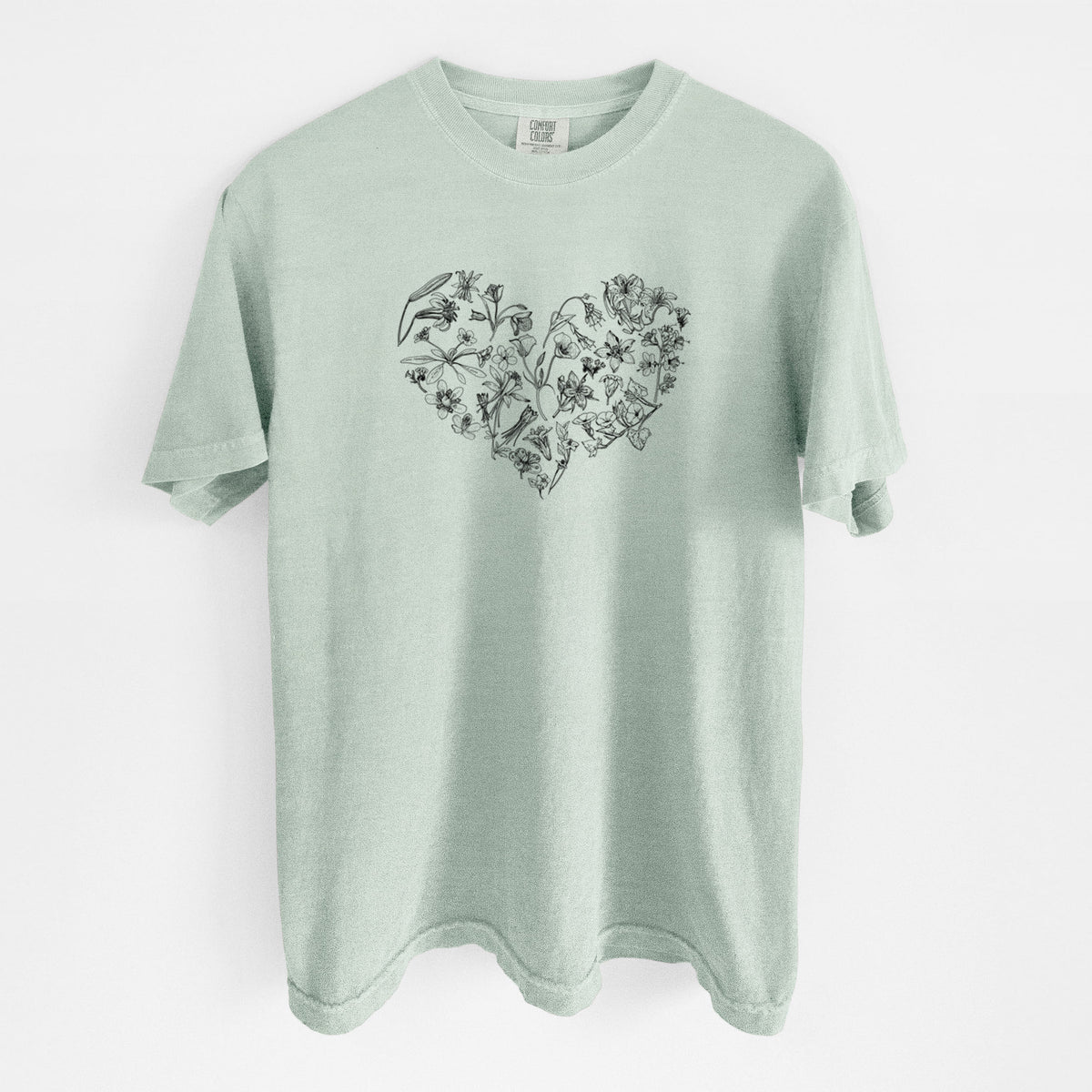 Bay green Comfort Colors t-shirt laid flat, printed with a heart shape filled with black ink California mountain wildflowers.