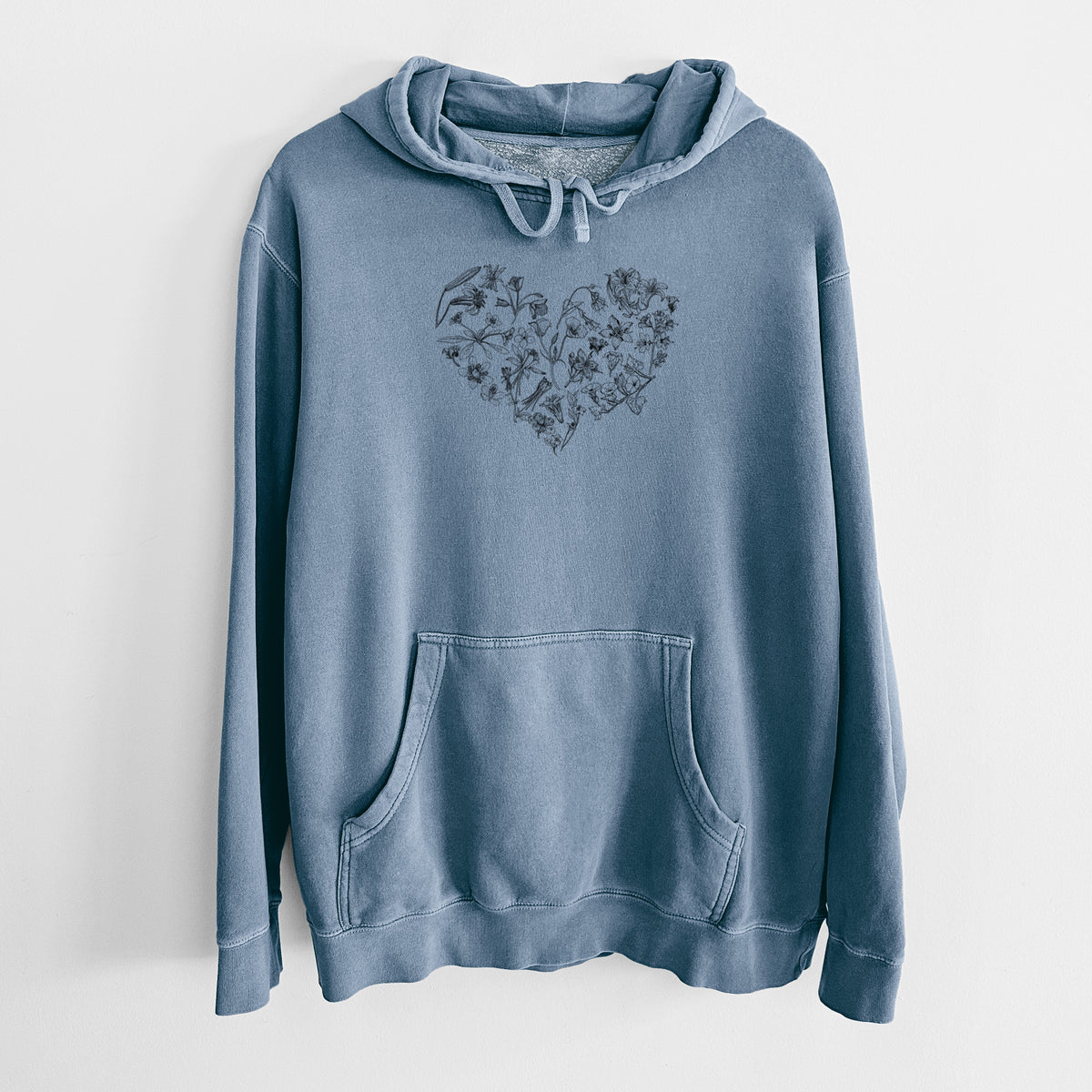 Slate blue pigment dyed hoodie laid flat, printed with a heart shape filled with black ink California mountain wildflowers.