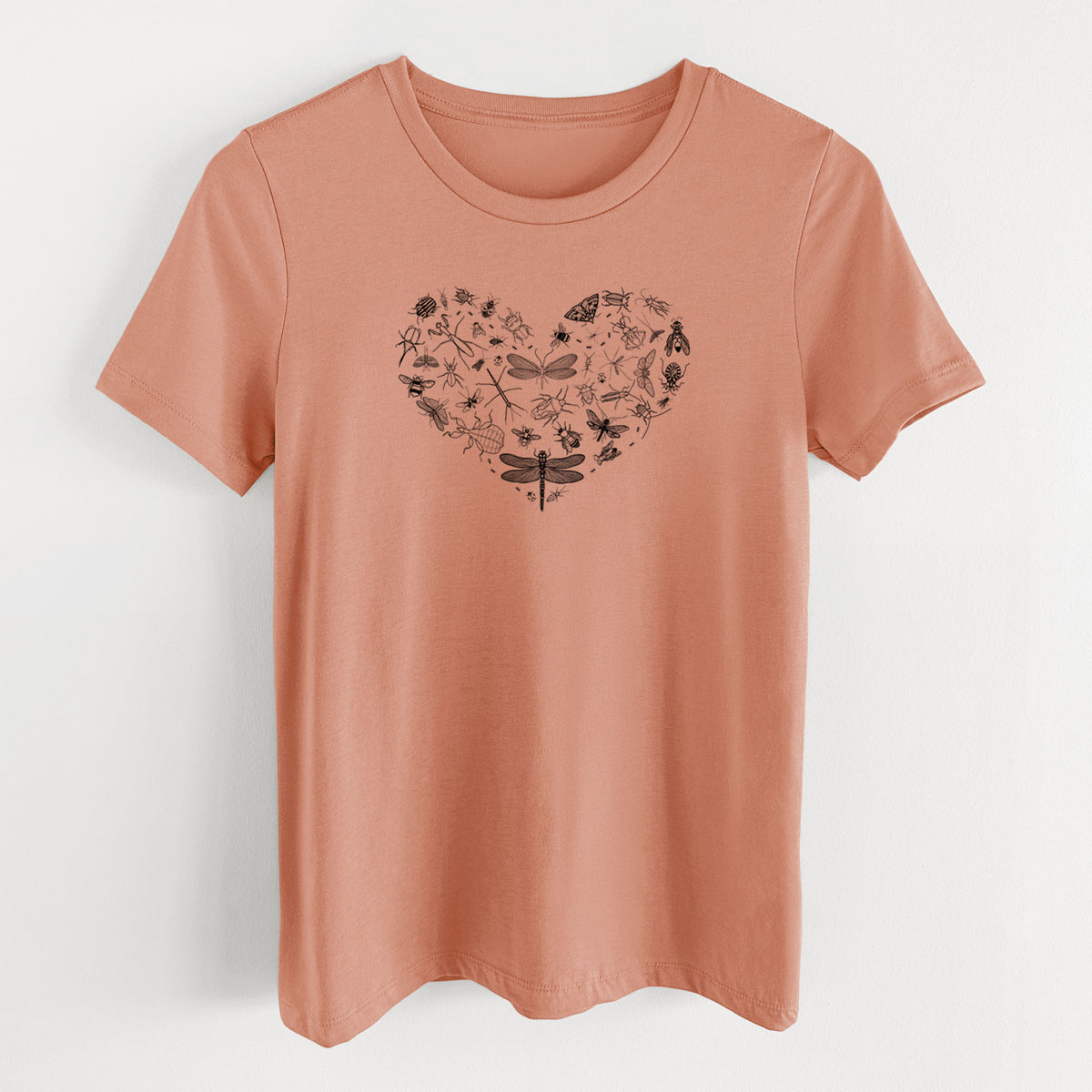 Terracotta orange women's relaxed fit cotton t-shirt laid flat, printed with a heart shape filled with small black ink insects, including dragonflies, beetles and bees.