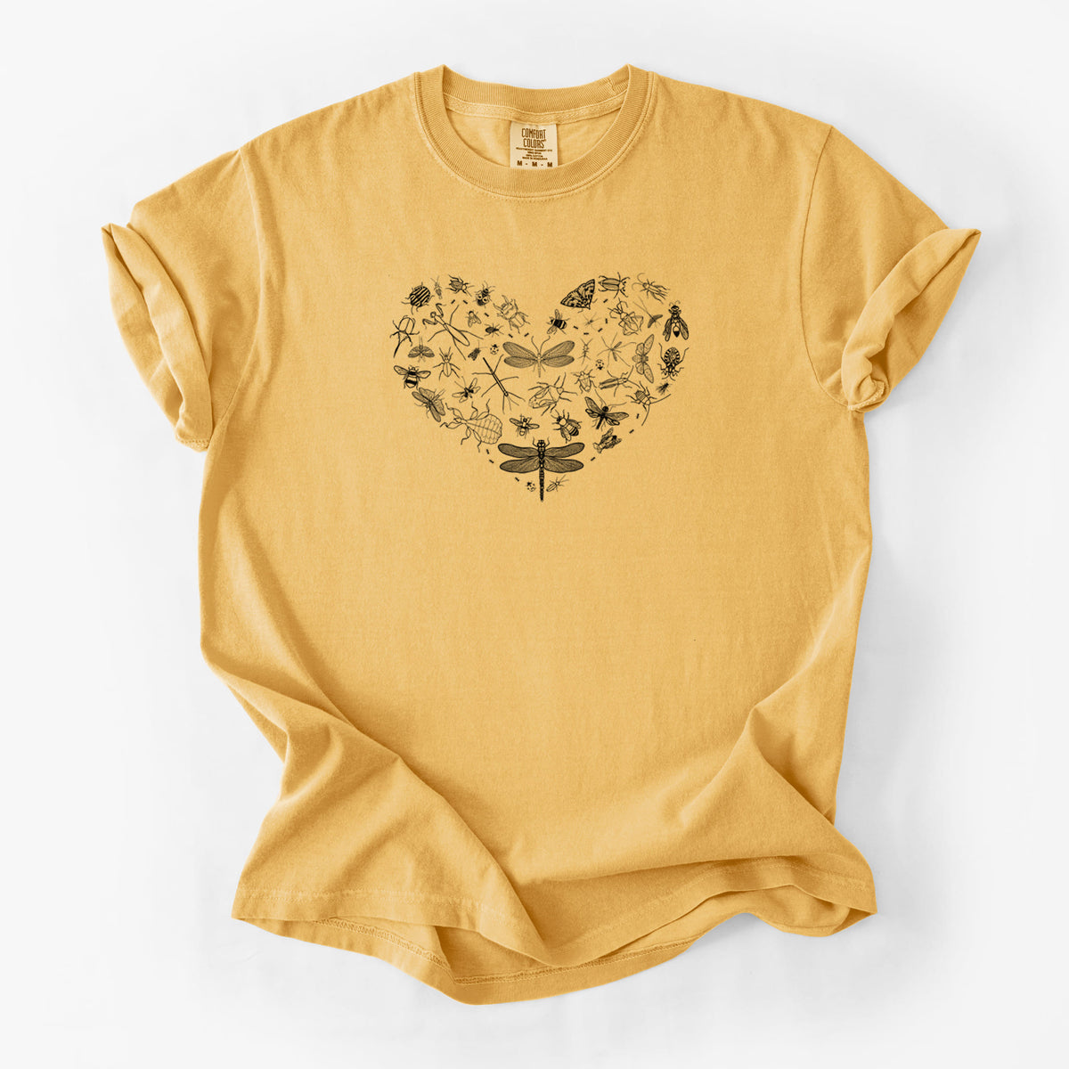 Golden wheat yellow Comfort Colors t-shirt laid flat, printed with a heart shape filled with small black ink insects, including dragonflies, beetles and bees.