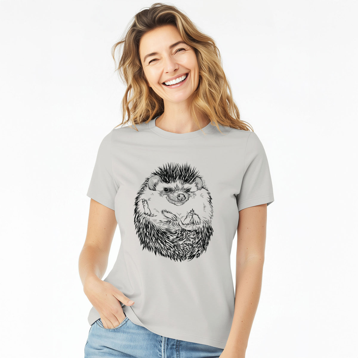 Woman wearing a lunar grey women's relaxed fit cotton t-shirt printed with a detailed black ink illustration of a hedgehog curled up and facing forward.