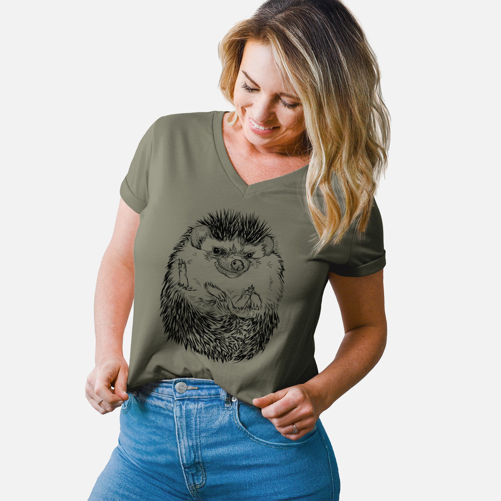Turquoise women's relaxed fit cotton V-neck t-shirt laid flat, printed with a detailed black ink illustration of a hedgehog curled up and facing forward.