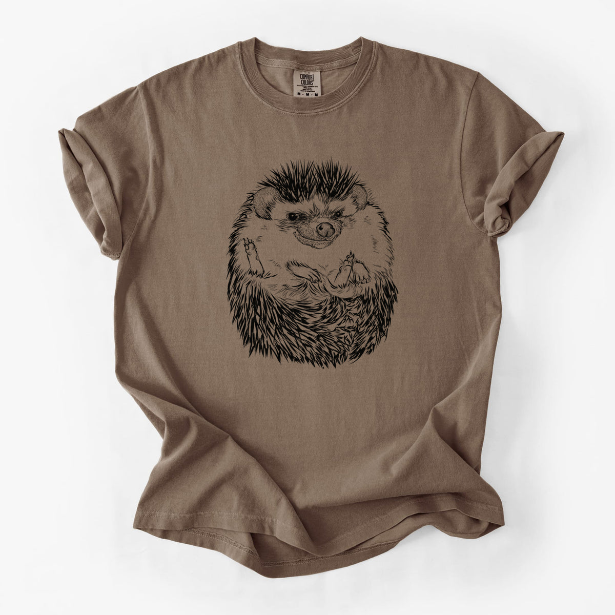 Espresso brown Comfort Colors t-shirt laid flat, printed with a detailed black ink illustration of a hedgehog curled up and facing forward.
