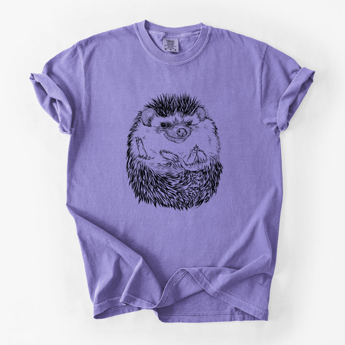 Violet purple Comfort Colors t-shirt laid flat, printed with a detailed black ink illustration of a hedgehog curled up and facing forward.