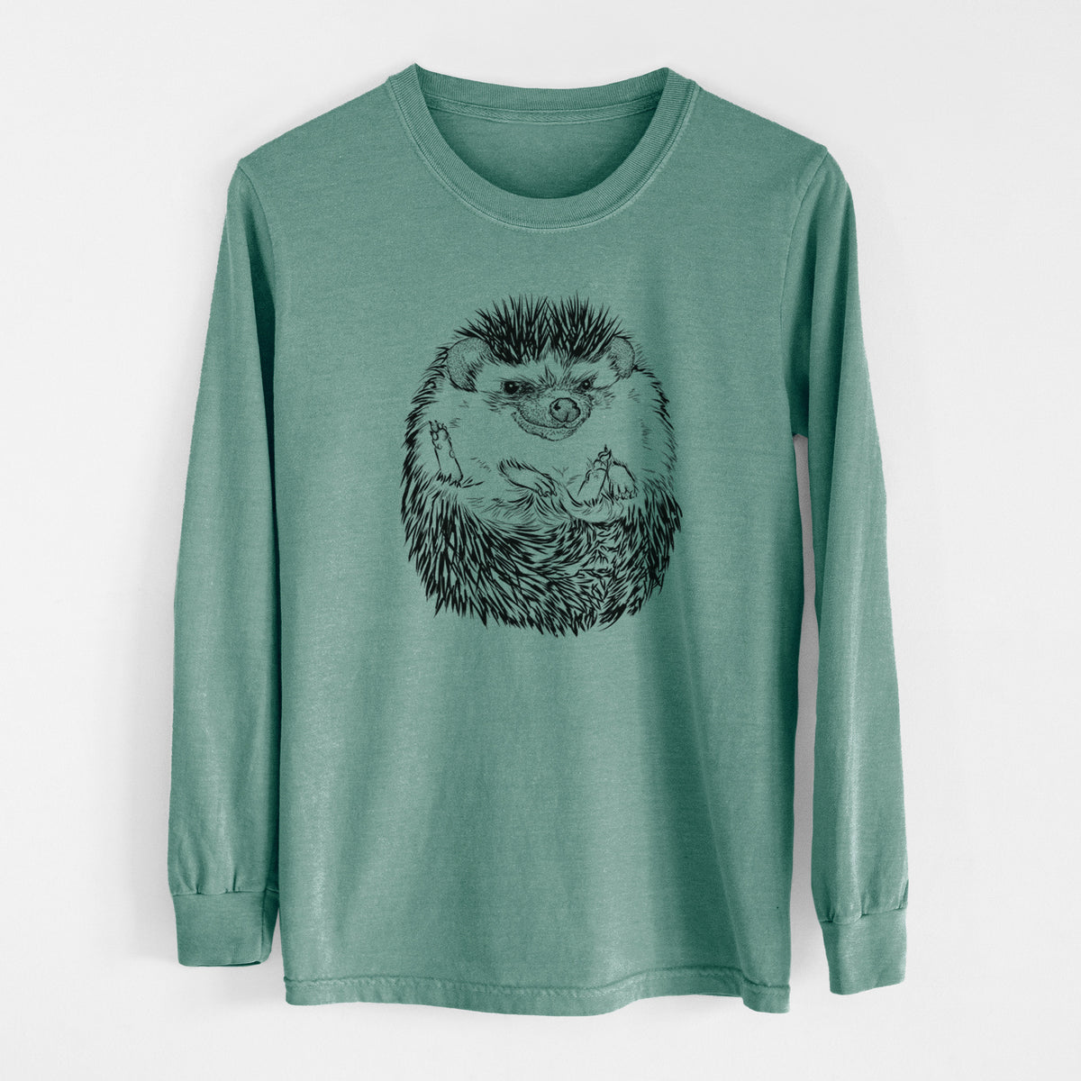 Pine green Comfort Colors long sleeve shirt laid flat, printed with a detailed black ink illustration of a hedgehog curled up and facing forward.