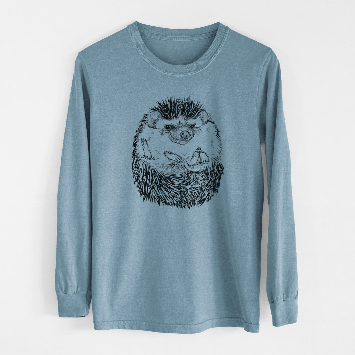 Steel blue Comfort Colors long sleeve shirt laid flat, printed with a detailed black ink illustration of a hedgehog curled up and facing forward.