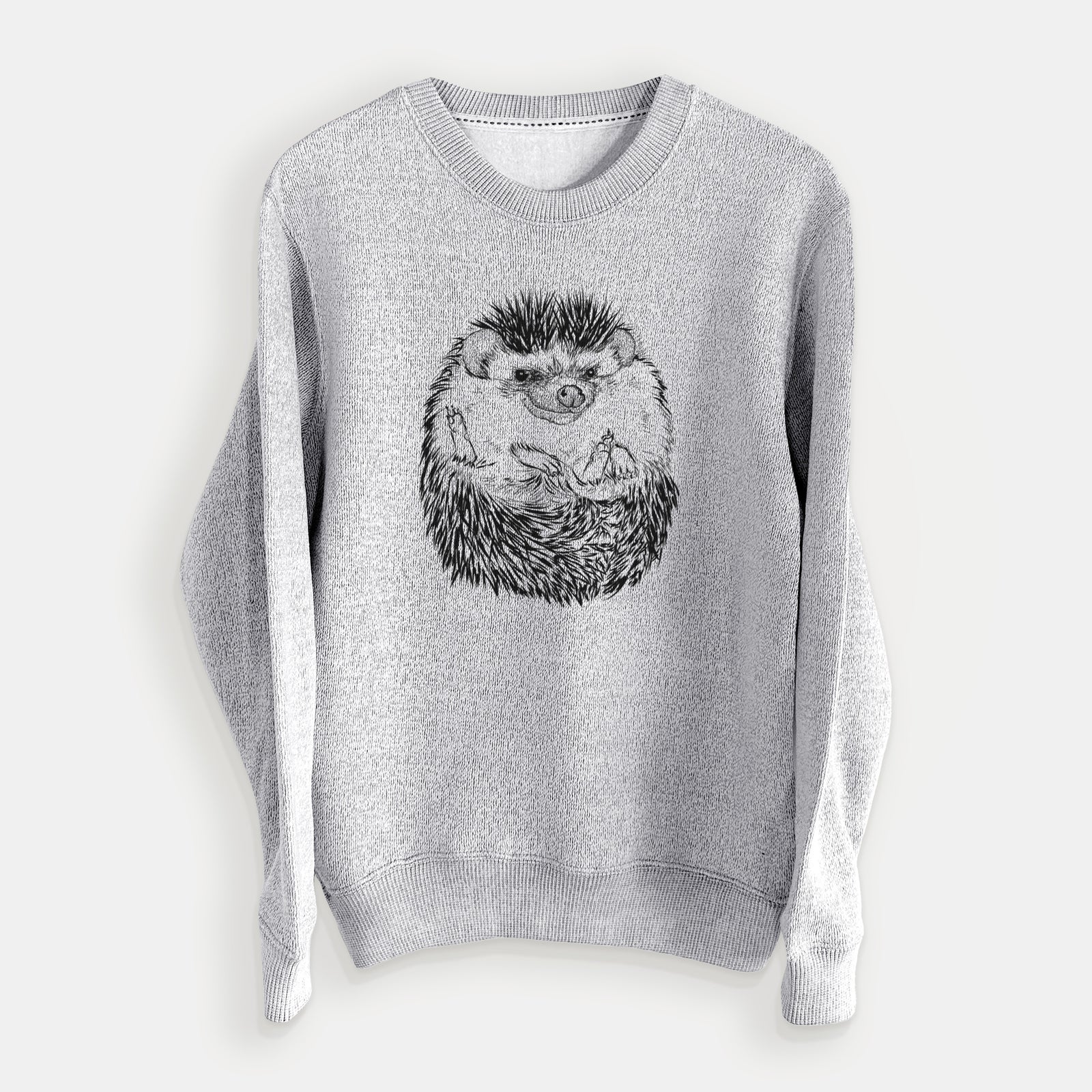 Salt and pepper knit sweatshirt laid flat, printed with a detailed black ink illustration of a hedgehog curled up and facing forward.