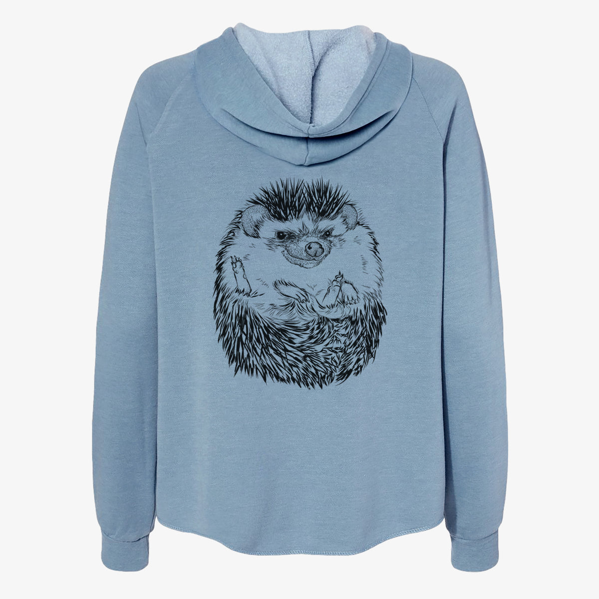 Misty blue women's Cali Wave zip-up sweatshirt laid flat, printed with a detailed black ink illustration of a hedgehog curled up and facing forward.