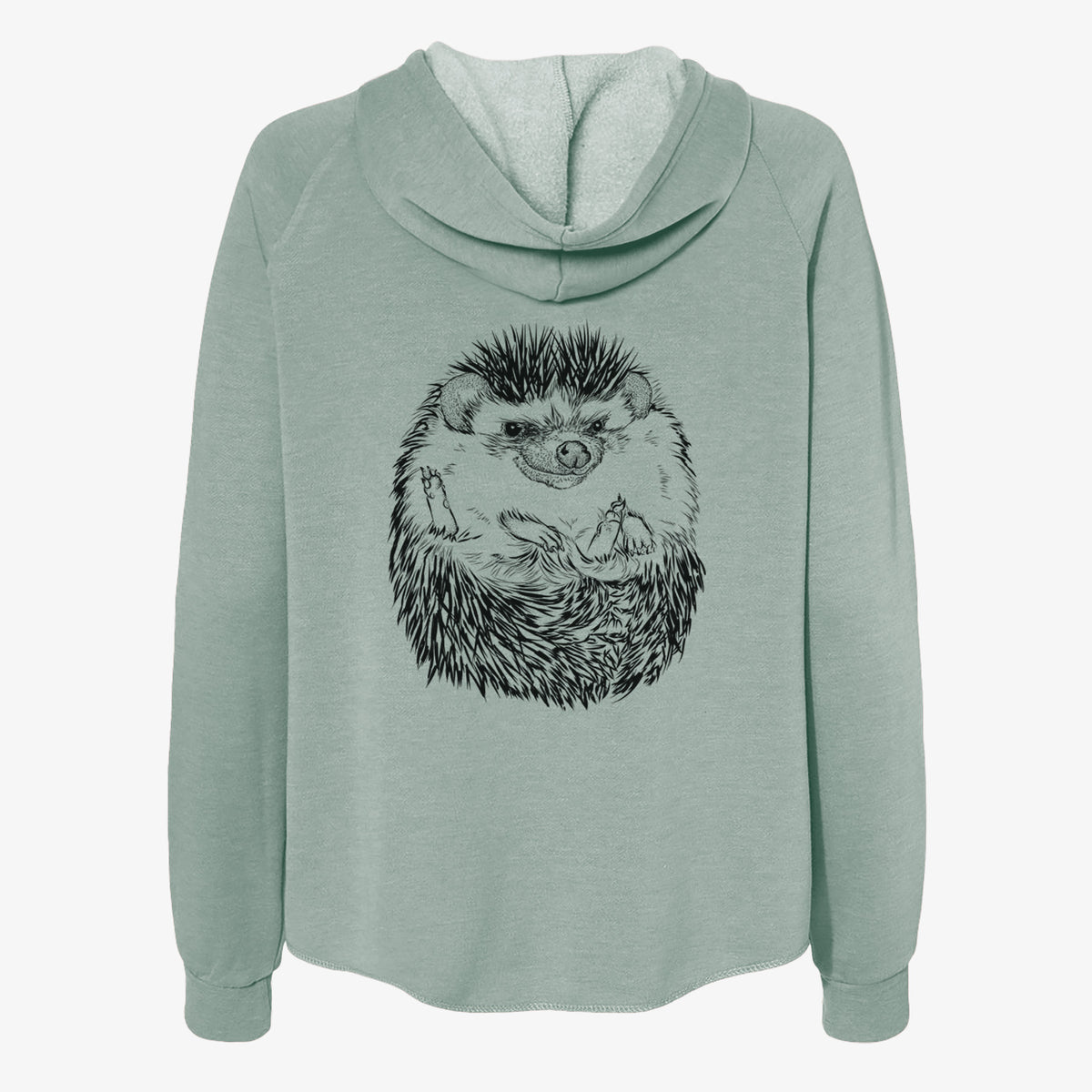 Sage green women's Cali Wave zip-up sweatshirt laid flat, printed with a detailed black ink illustration of a hedgehog curled up and facing forward.