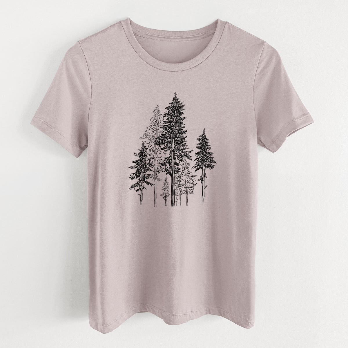 Pink gravel women's relaxed fit cotton t-shirt laid flat, printed with a black ink illustration of a forest of tall hemlock trees.