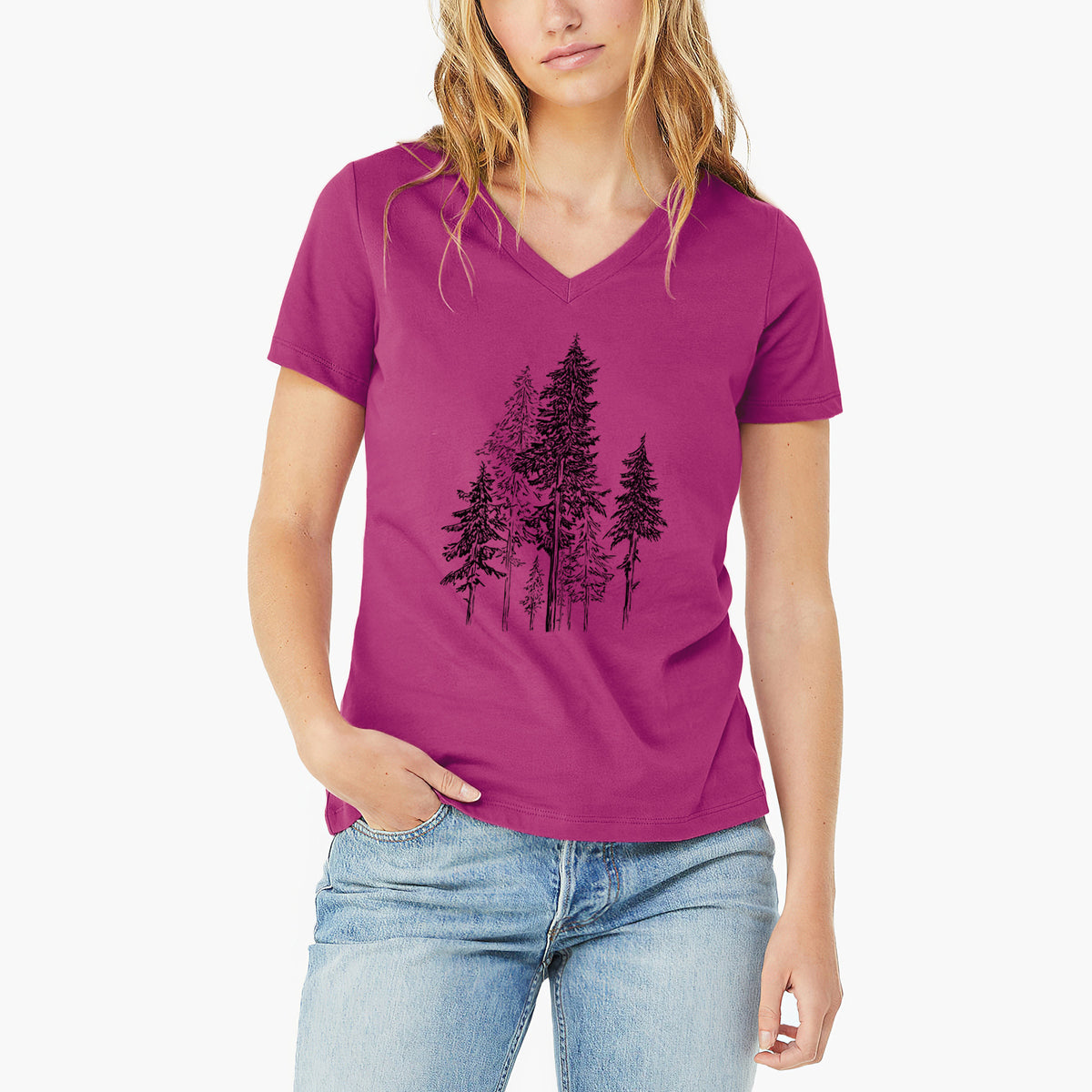 Woman wearing a berry pink women's relaxed fit cotton V-neck t-shirt printed with a black ink illustration of a forest of tall hemlock trees.