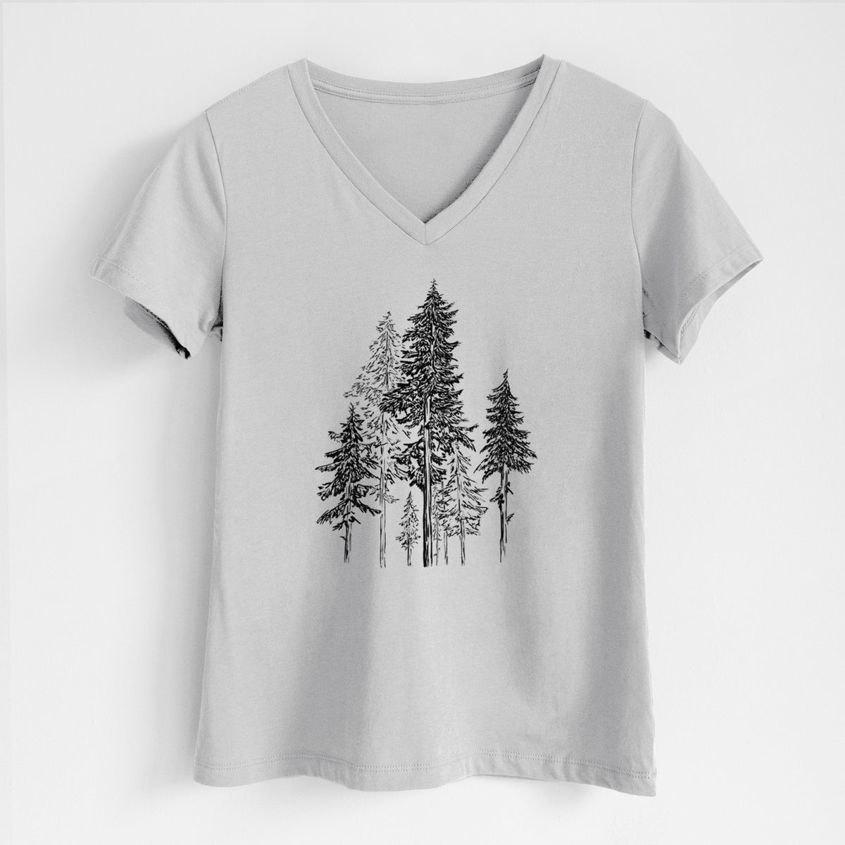 Lunar grey women's relaxed fit cotton V-neck t-shirt laid flat, printed with a black ink illustration of a forest of tall hemlock trees.