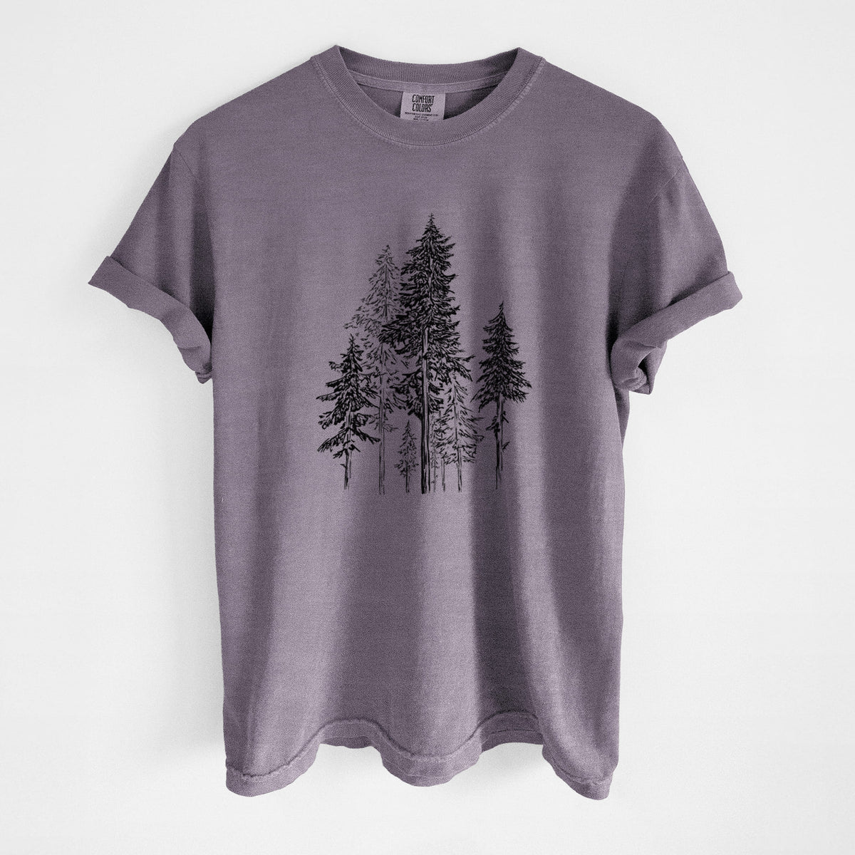 Wine red Comfort Colors t-shirt laid flat, printed with a black ink illustration of a forest of tall hemlock trees.