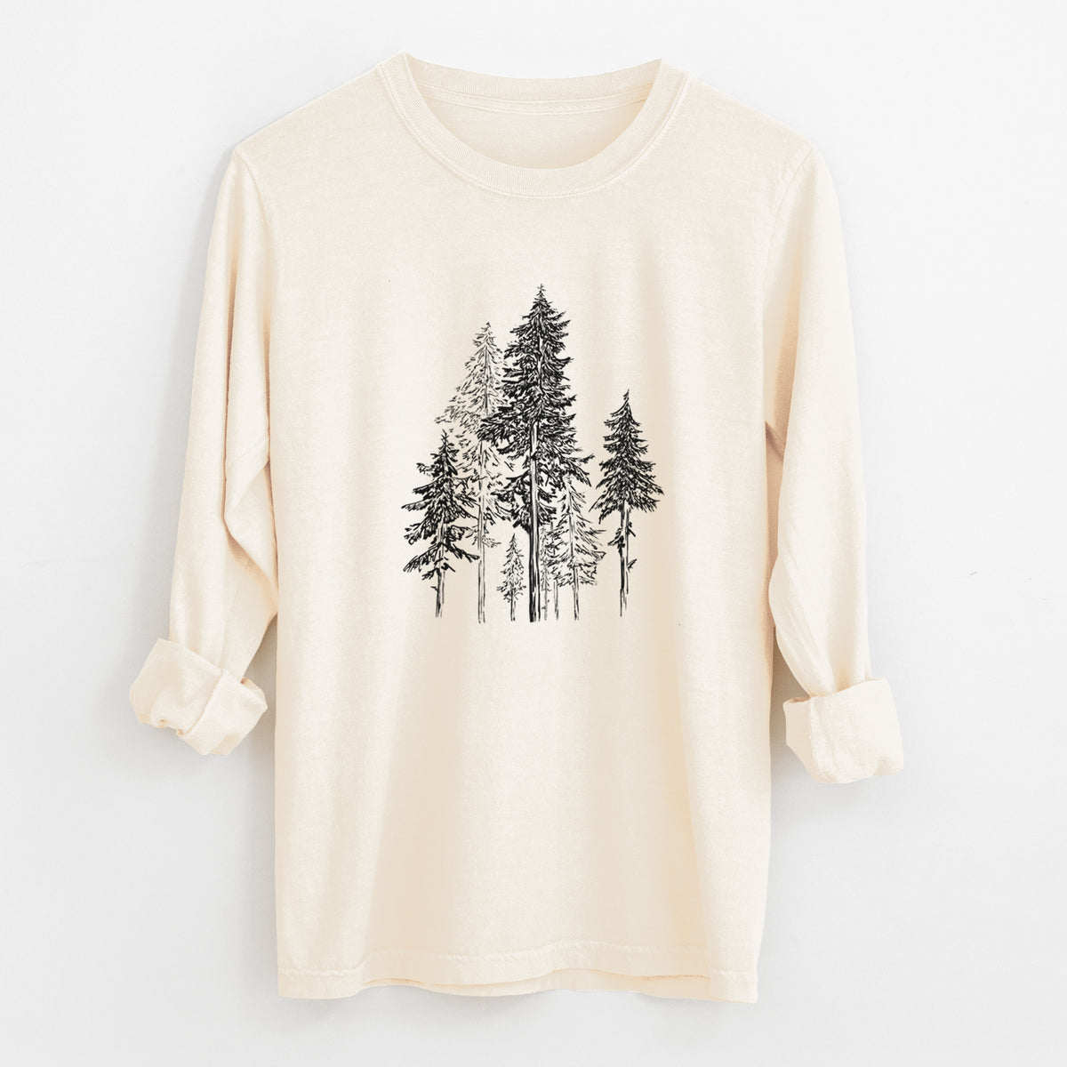 Ivory Comfort Colors long sleeve shirt laid flat with the cuffs rolled, printed with a black ink illustration of a forest of tall hemlock trees.
