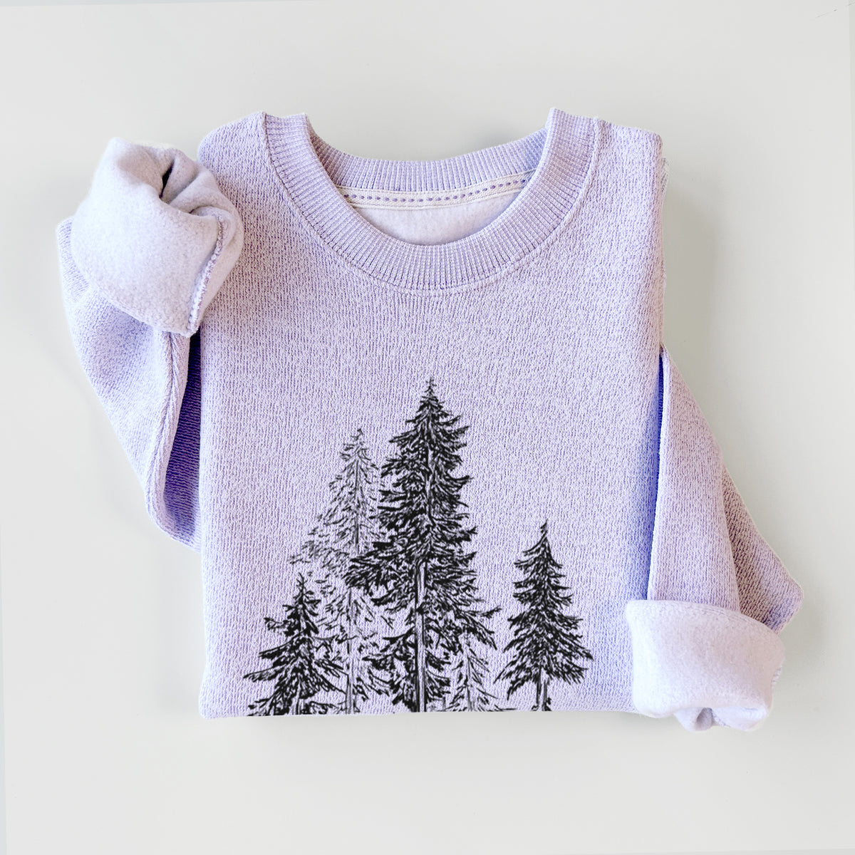 Ice purple knit sweatshirt printed with a black ink illustration of a forest of tall hemlock trees, styled flat.