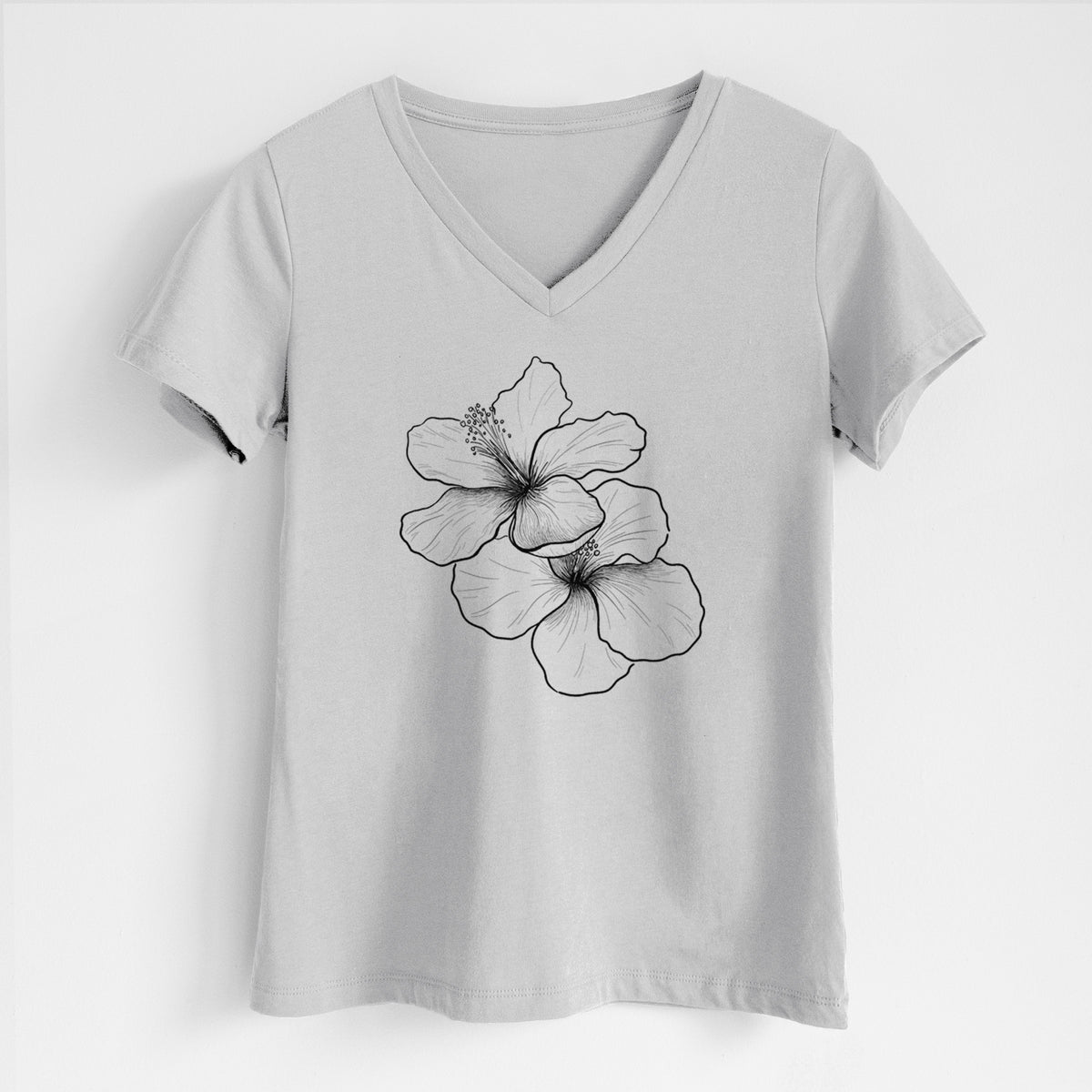 Lunar grey women's relaxed fit cotton V-neck t-shirt laid flat, printed with a black ink line drawing of three hibiscus flowers.