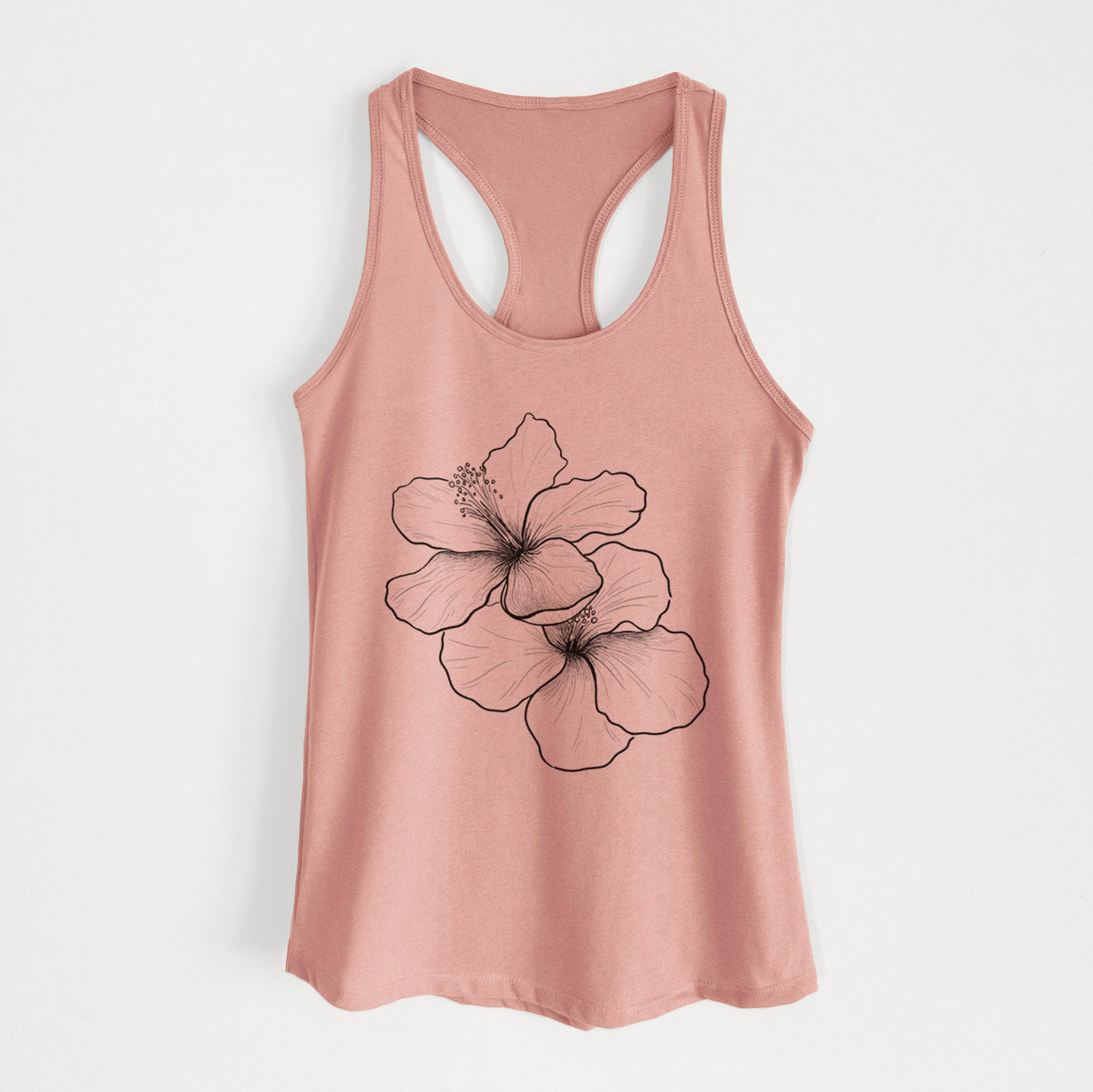 Desert pink women's racerback tank top laid flat, printed with a black ink line drawing of three hibiscus flowers.