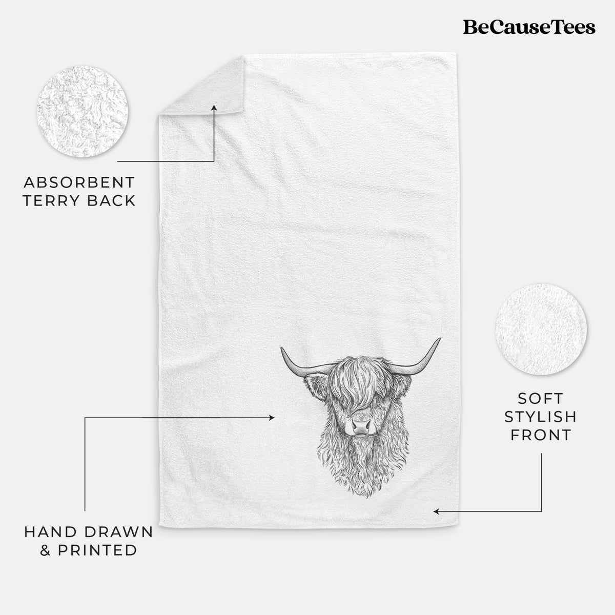 White hand towel printed with a detailed black ink portrait of a shaggy highland cow with long curved horns.