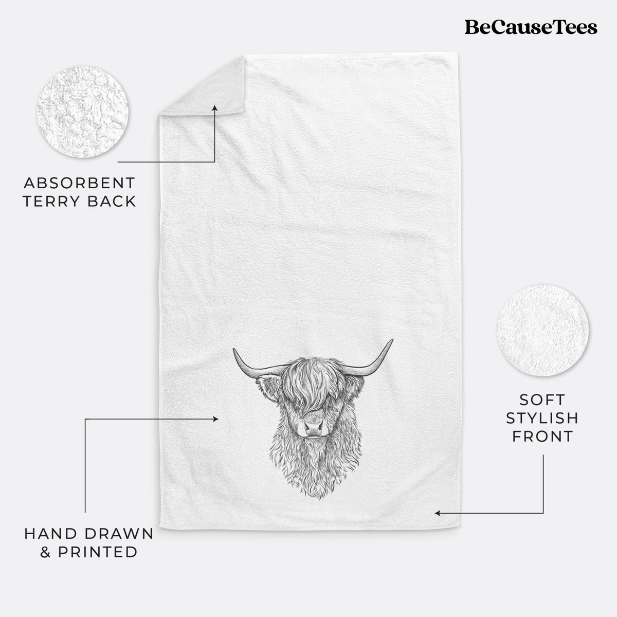 White hand towel printed with a detailed black ink portrait of a shaggy highland cow with long curved horns.