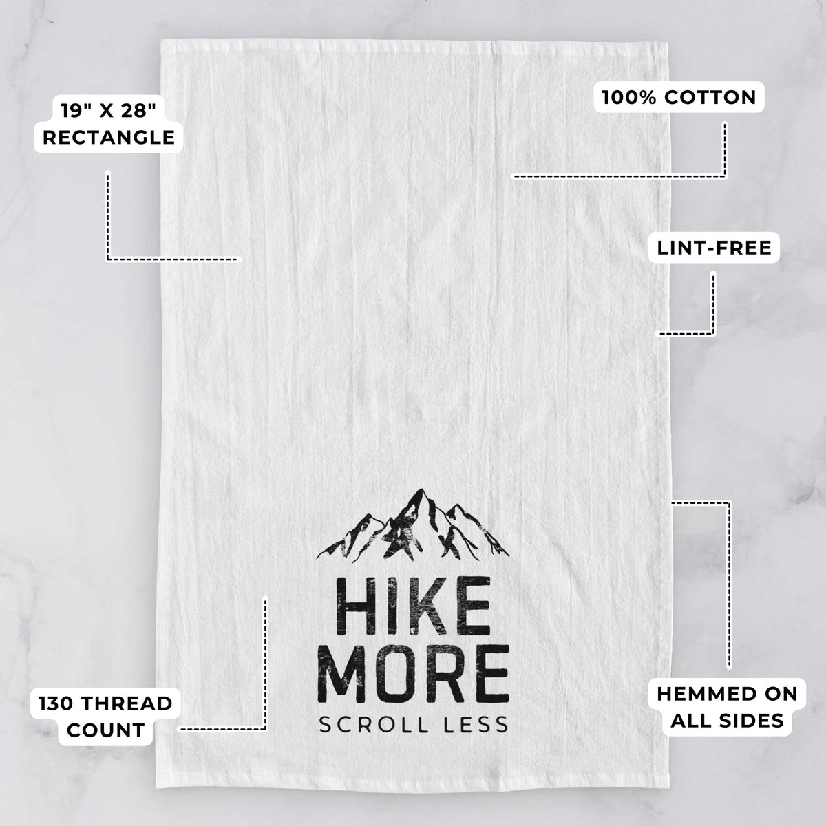 White tea towel printed with black mountain peaks above the bold words Hike More, Scroll Less, with feature labels: 19 by 28 inch rectangle, 100% cotton, lint-free, 130 thread count, hemmed on all sides.