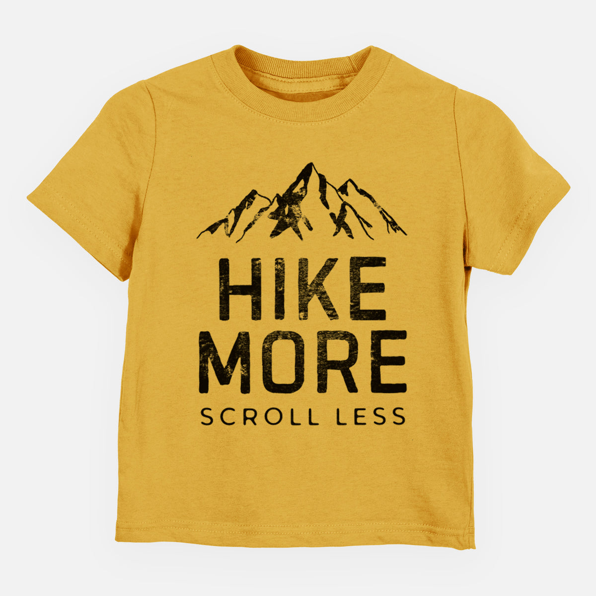 Honeycomb yellow toddler t-shirt laid flat, printed with black mountain peaks above the bold words Hike More, Scroll Less.