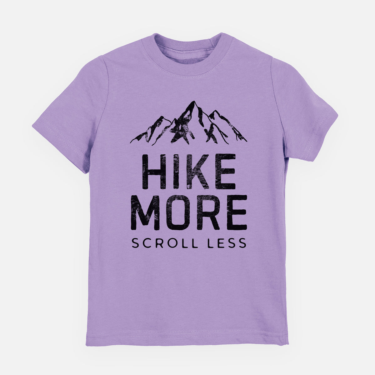 Lavender youth t-shirt laid flat, printed with black mountain peaks above the bold words Hike More, Scroll Less.