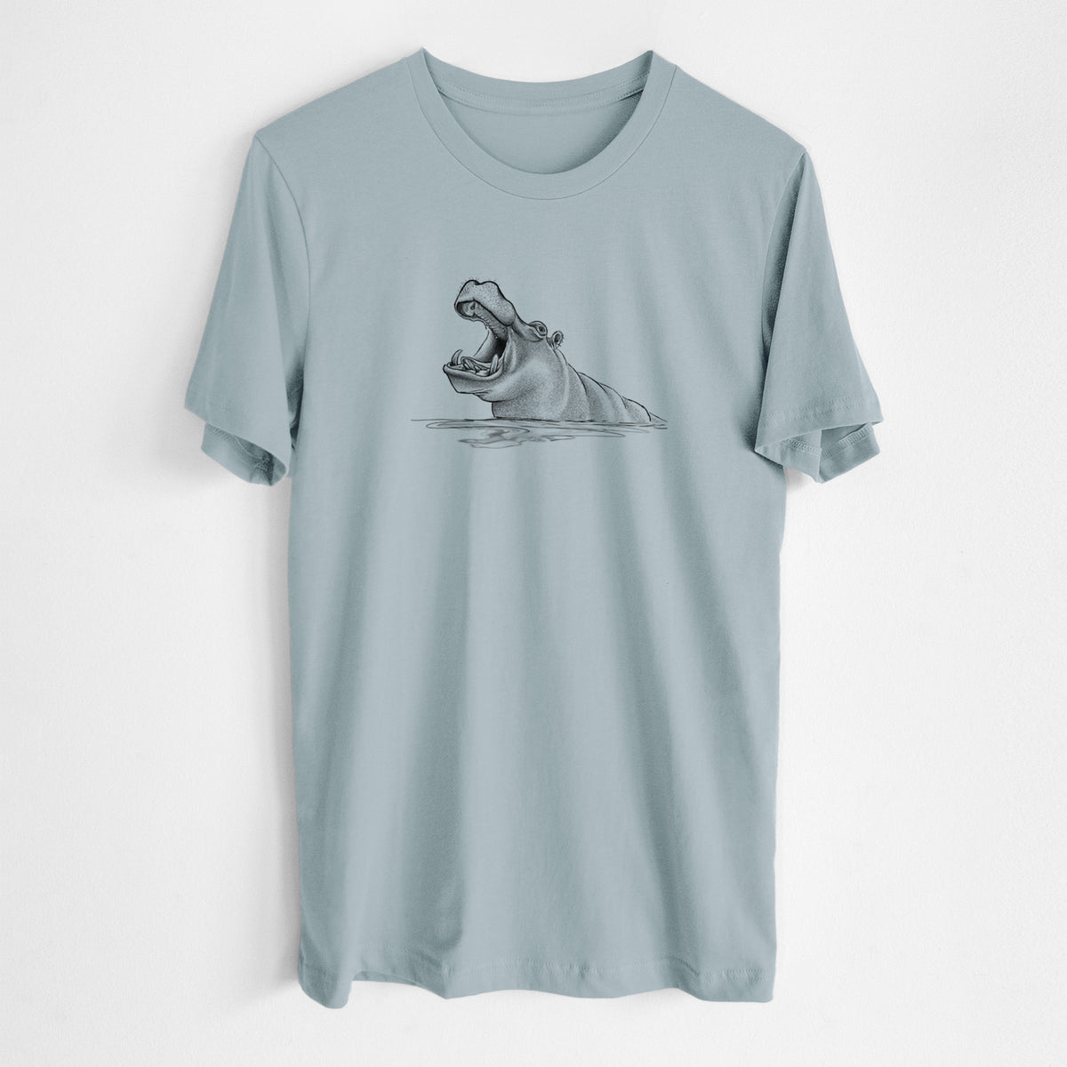 Vintage denim lightweight cotton t-shirt laid flat, printed with a black ink illustration of a hippo yawning with its mouth wide open, half submerged in water.