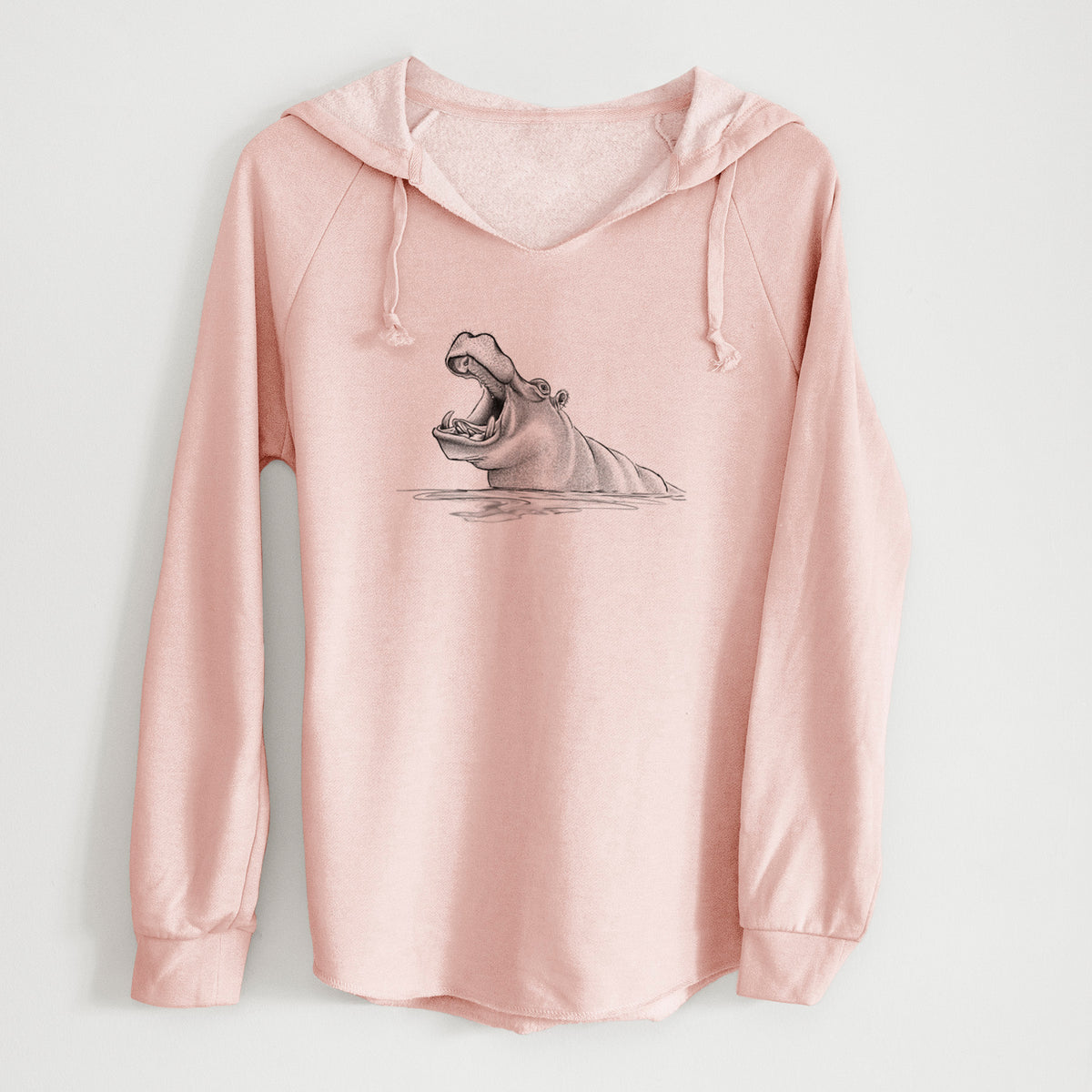 Blush pink women's Cali Wave hooded sweatshirt laid flat, printed with a black ink illustration of a hippo yawning with its mouth wide open, half submerged in water.