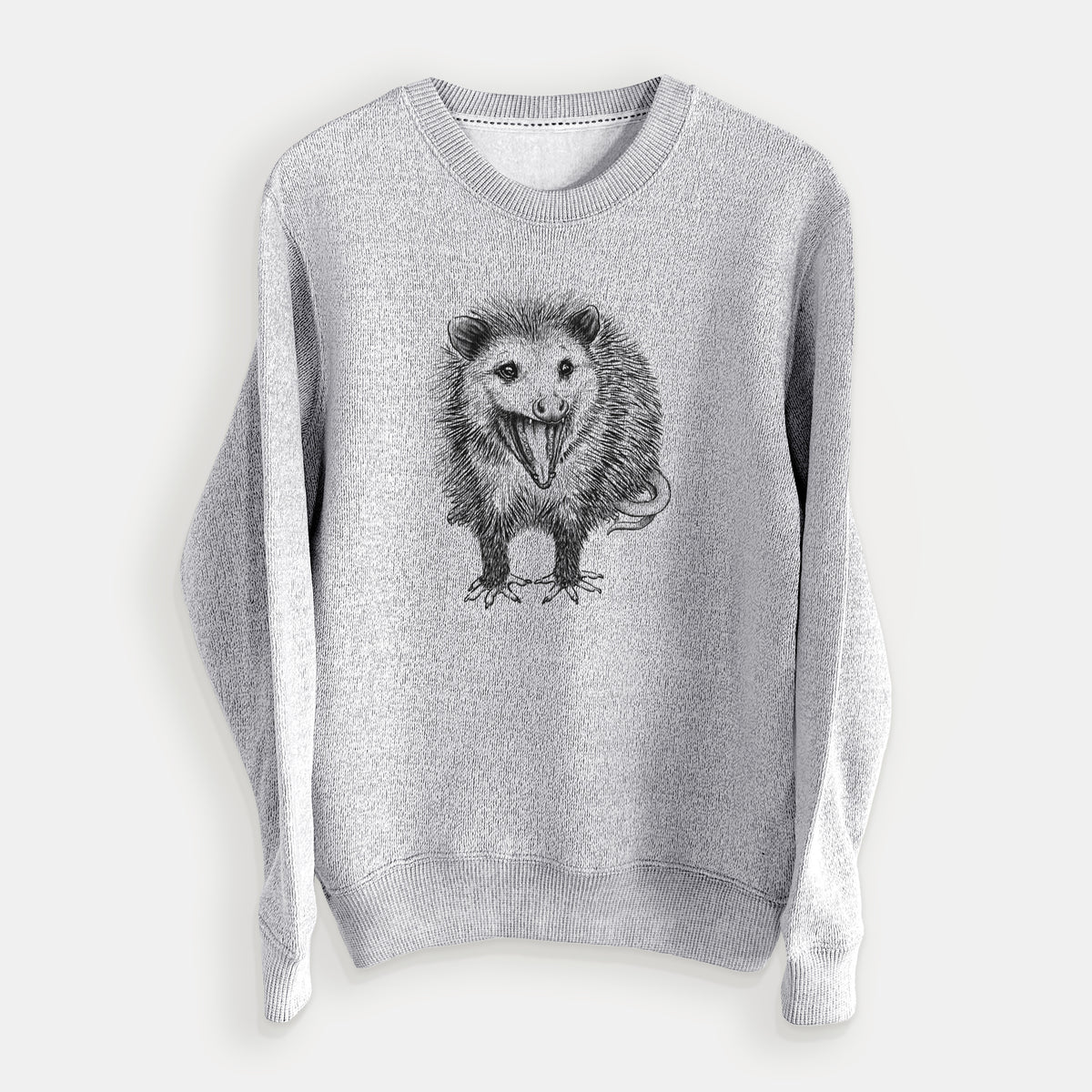 Salt and pepper knit sweatshirt laid flat, printed with a detailed black ink illustration of an opossum standing and facing forward, mouth open wide in a hiss, with shaggy fur and its tail curled behind.