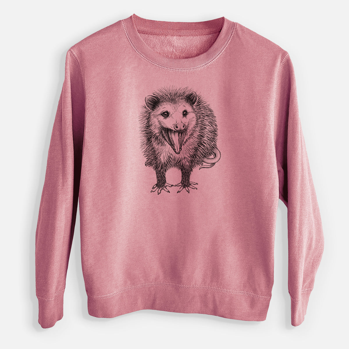 Mauve pink youth crewneck sweatshirt laid flat, printed with a detailed black ink illustration of an opossum standing and facing forward, mouth open wide in a hiss, with shaggy fur and its tail curled behind.