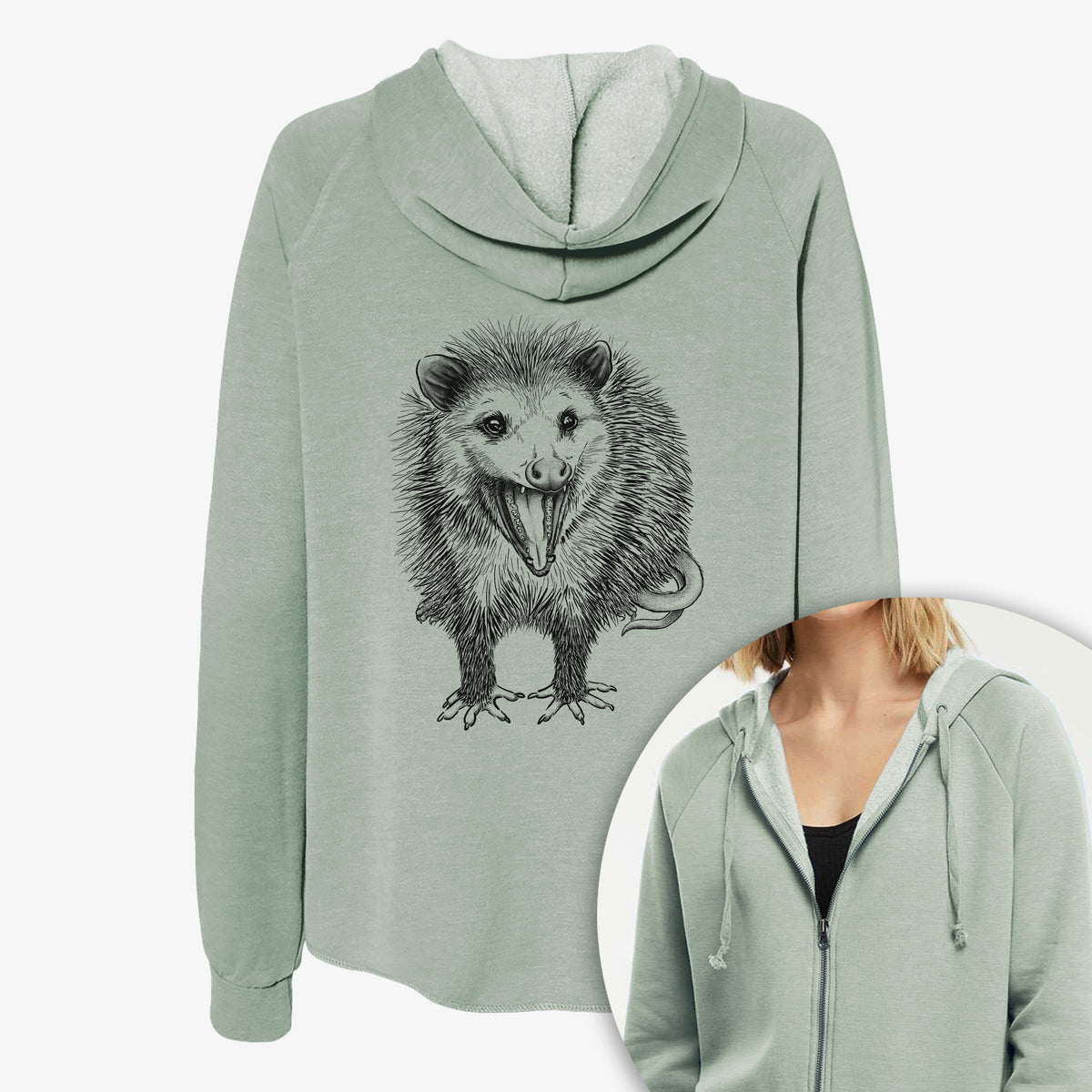 Women's Cali Wave zip-up sweatshirt printed with a detailed black ink illustration of an opossum standing and facing forward, mouth open wide in a hiss, with shaggy fur and its tail curled behind, with a close-up of the zipper.