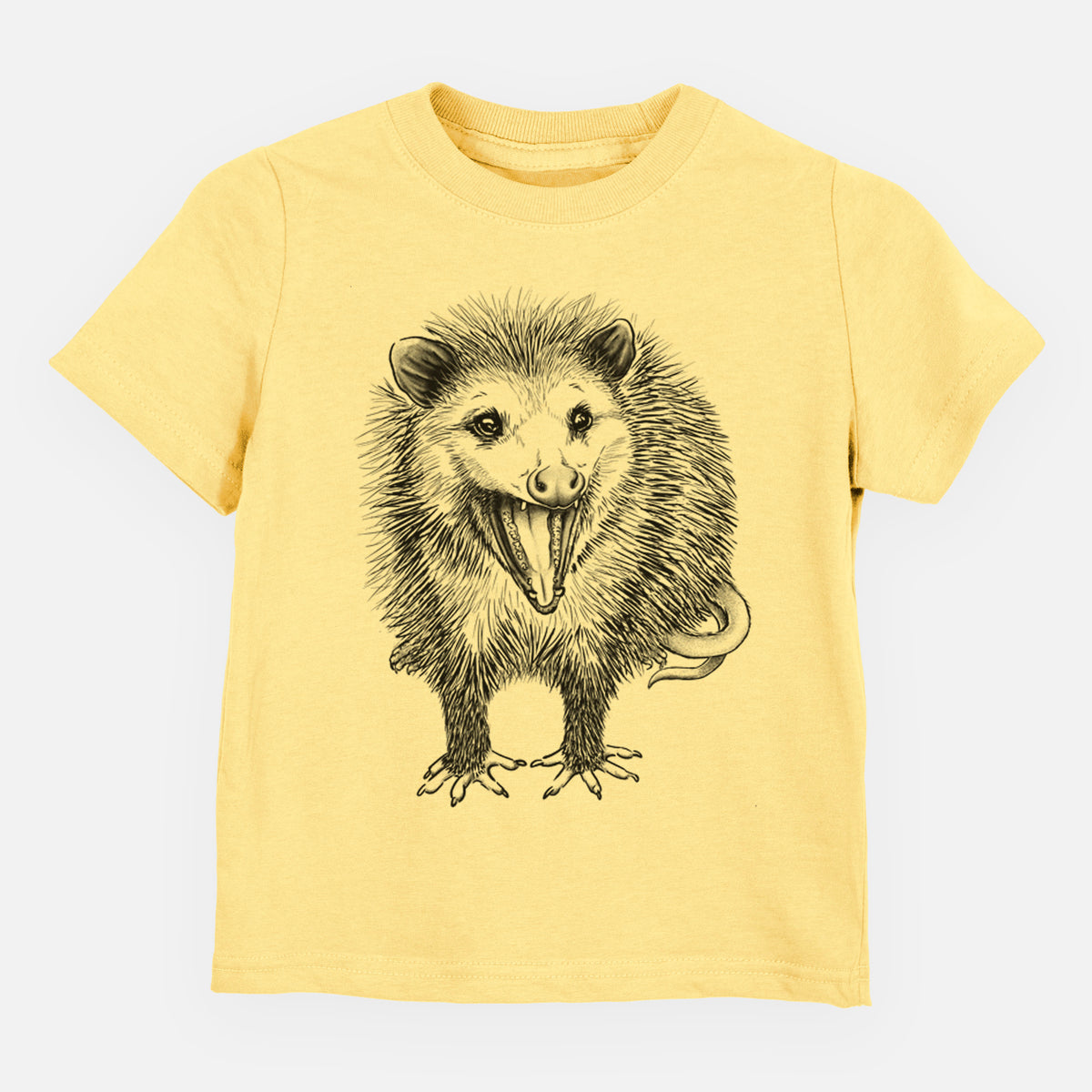 Butter yellow toddler t-shirt laid flat, printed with a detailed black ink illustration of an opossum standing and facing forward, mouth open wide in a hiss, with shaggy fur and its tail curled behind.