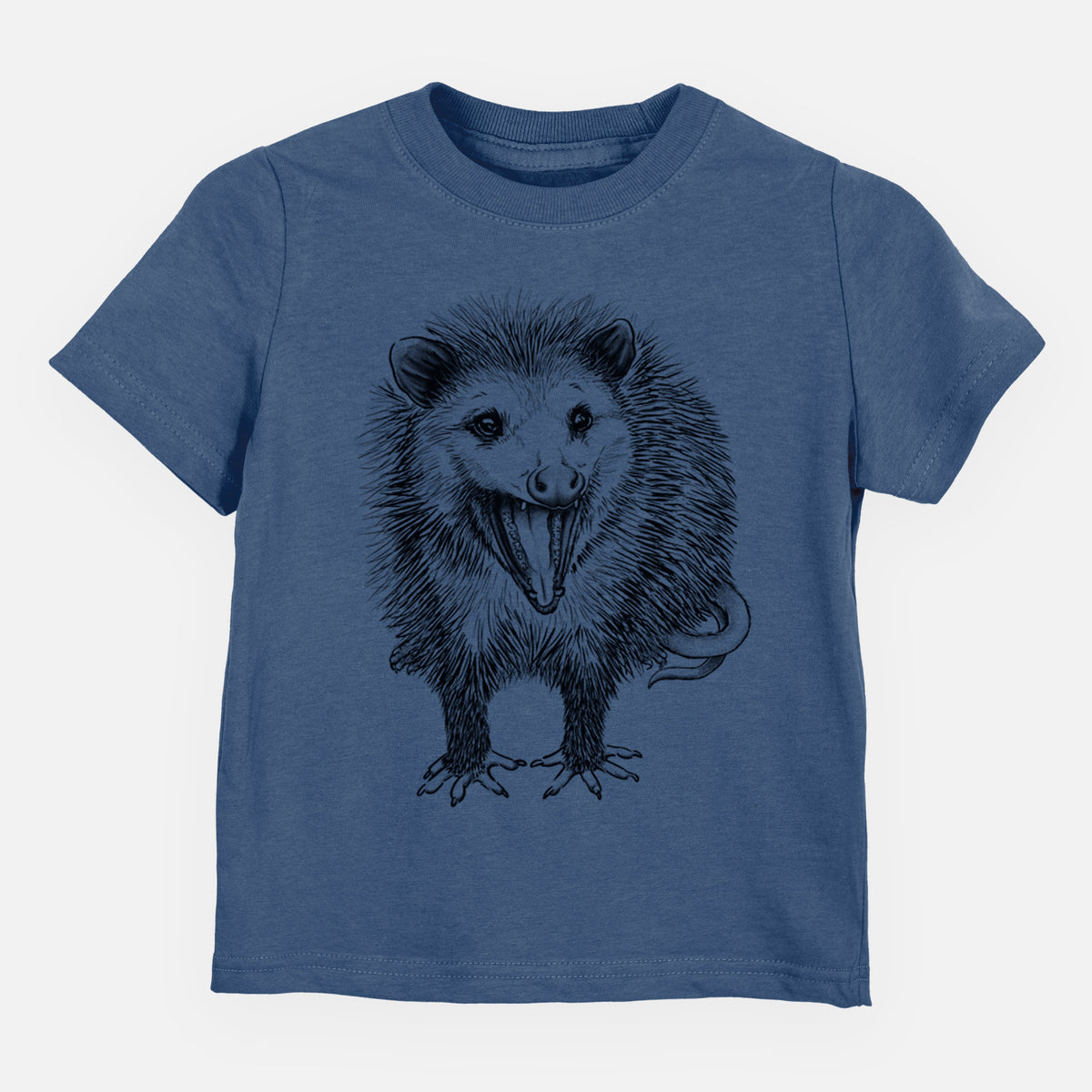 Indigo blue toddler t-shirt laid flat, printed with a detailed black ink illustration of an opossum standing and facing forward, mouth open wide in a hiss, with shaggy fur and its tail curled behind.