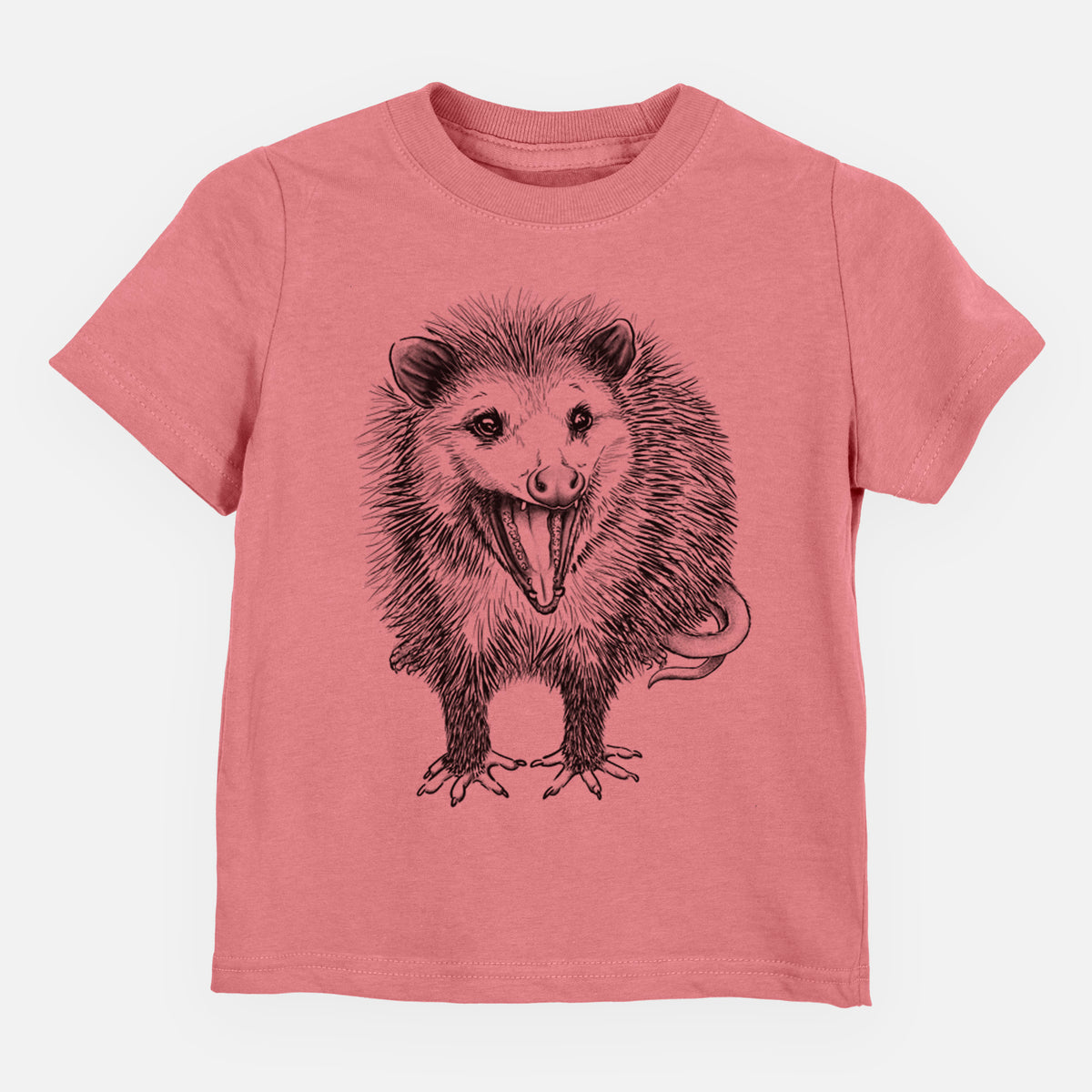 Mauve pink toddler t-shirt laid flat, printed with a detailed black ink illustration of an opossum standing and facing forward, mouth open wide in a hiss, with shaggy fur and its tail curled behind.