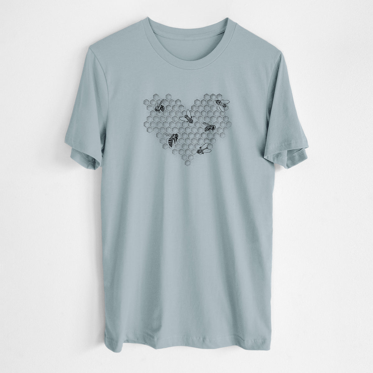 Vintage denim lightweight cotton t-shirt laid flat, printed with a black ink heart made of honeycomb cells with small bees crawling across it.