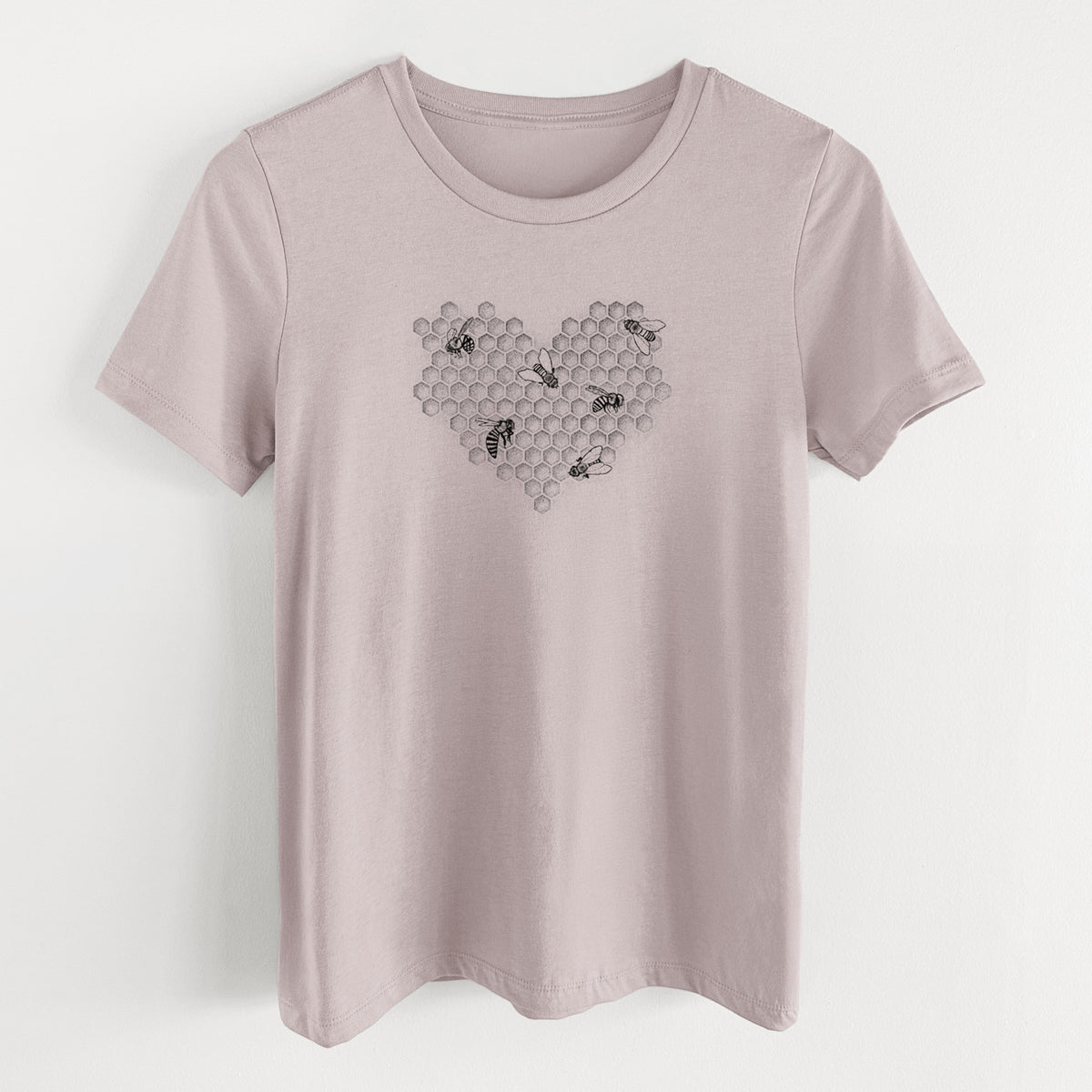 Pink gravel women's relaxed fit cotton t-shirt laid flat, printed with a black ink heart made of honeycomb cells with small bees crawling across it.