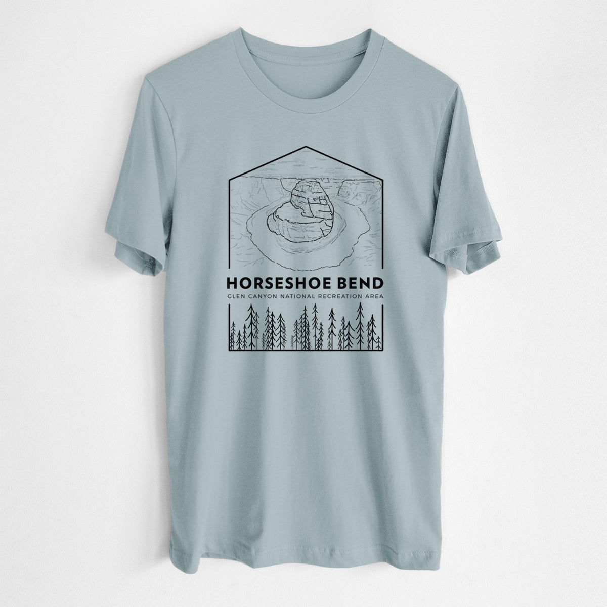 Vintage denim lightweight cotton t-shirt laid flat, printed with a black line art badge of Horseshoe Bend above pine trees, with the words Horseshoe Bend.