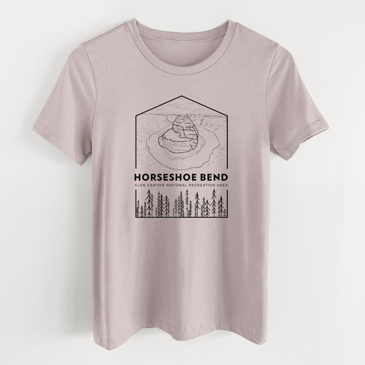 Pink gravel women's relaxed fit cotton t-shirt laid flat, printed with a black line art badge of Horseshoe Bend above pine trees, with the words Horseshoe Bend.