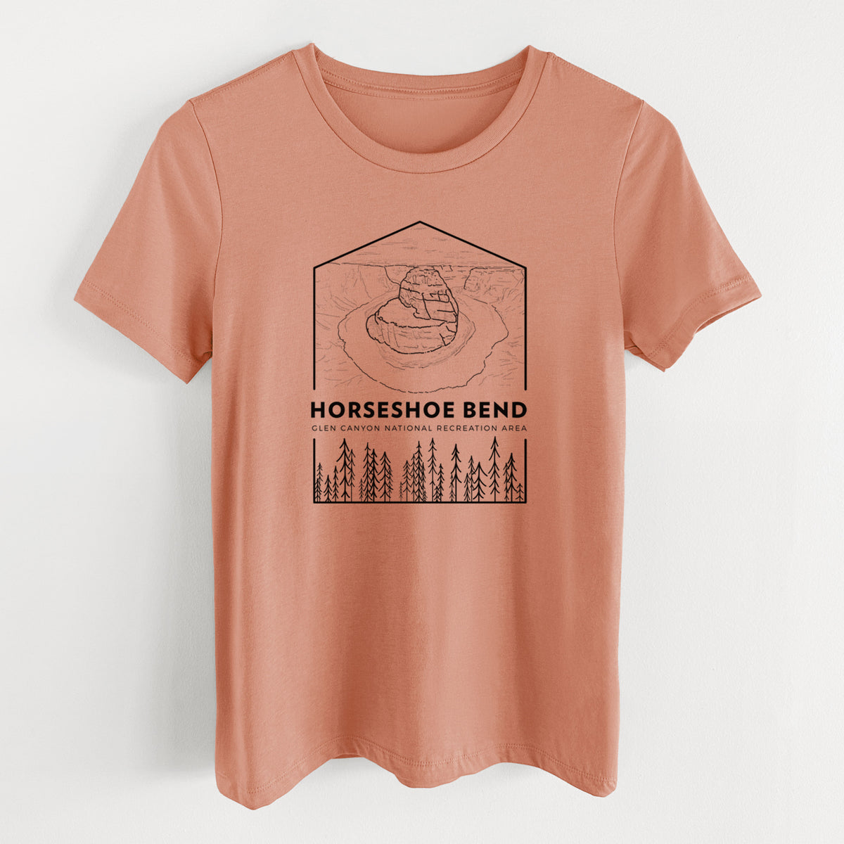 Terracotta orange women's relaxed fit cotton t-shirt laid flat, printed with a black line art badge of Horseshoe Bend above pine trees, with the words Horseshoe Bend.