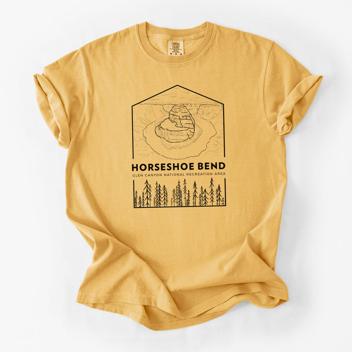 Golden wheat yellow Comfort Colors t-shirt laid flat, printed with a black line art badge of Horseshoe Bend above pine trees, with the words Horseshoe Bend.