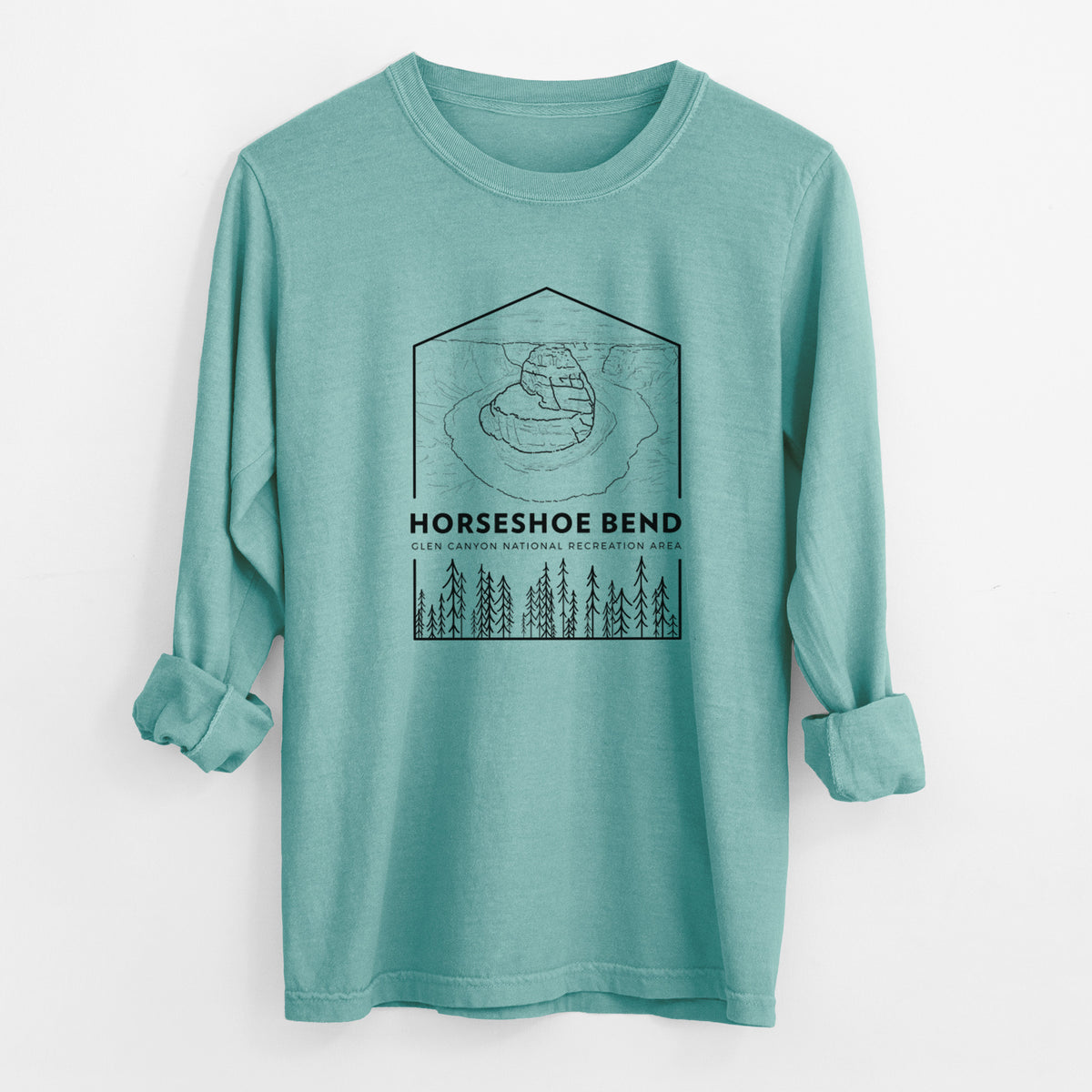 Reef green Comfort Colors long sleeve shirt laid flat with the cuffs rolled, printed with a black line art badge of Horseshoe Bend above pine trees, with the words Horseshoe Bend.