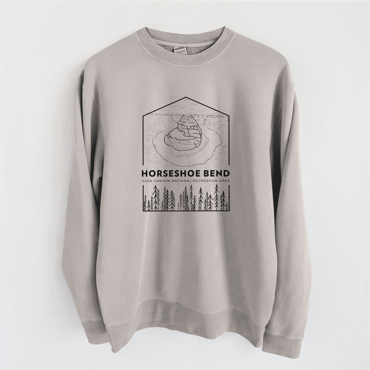 Cement grey pigment dyed crewneck sweatshirt laid flat, printed with a black line art badge of Horseshoe Bend above pine trees, with the words Horseshoe Bend.